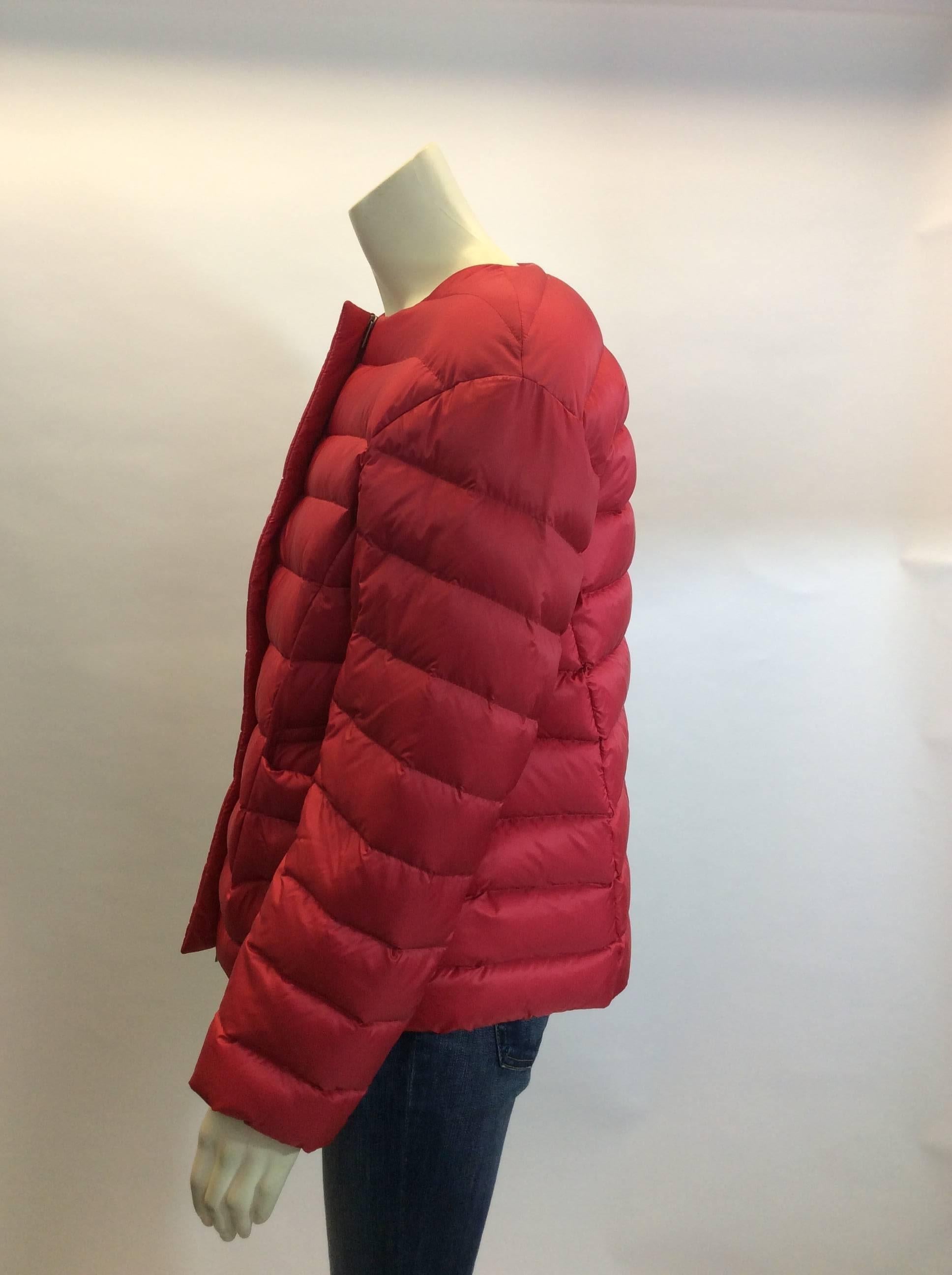 Jil Sander Red Down Jacket
Zip up jacket with two exterior pockets
Polyester lining
Down filled
Made in Italy 
Size 36
$325