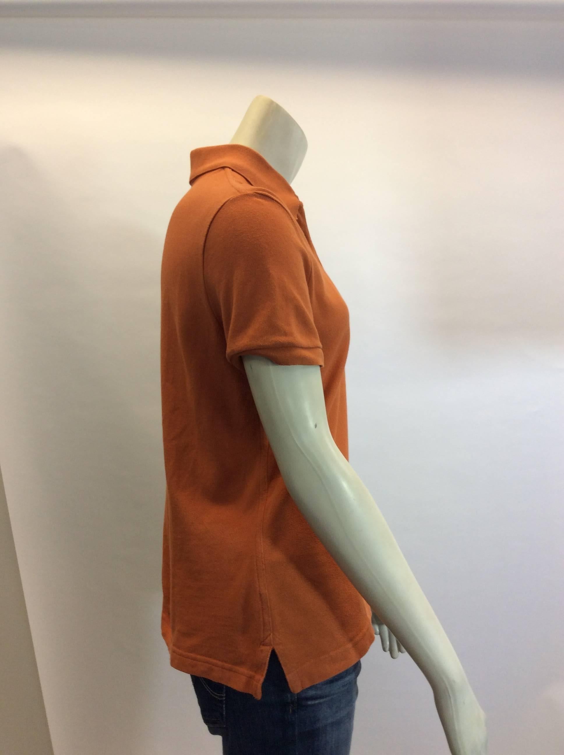 Hermes Orange Cotton Polo
100% cotton
Made in Italy 
$108
Short sleeve
H logo on front