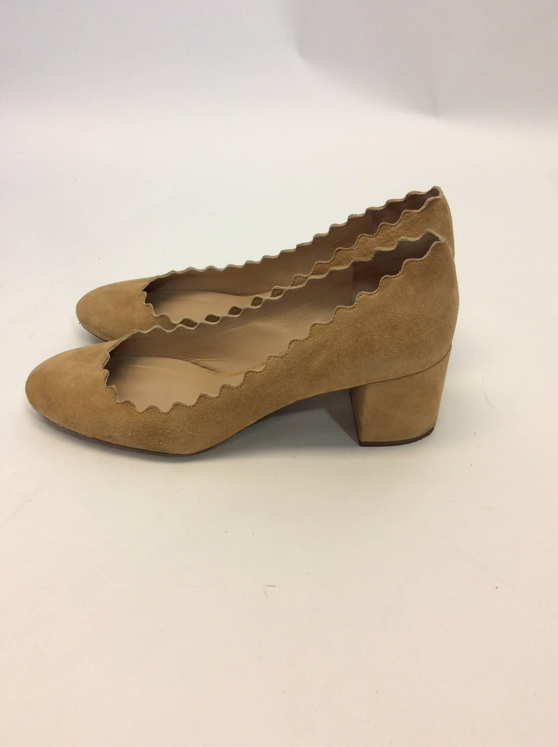 Chloe Suede Scalloped Heels
Suede exterior, leather interior
Made in Italy
Size 36
$250
Scalloped trim
3 inch heel