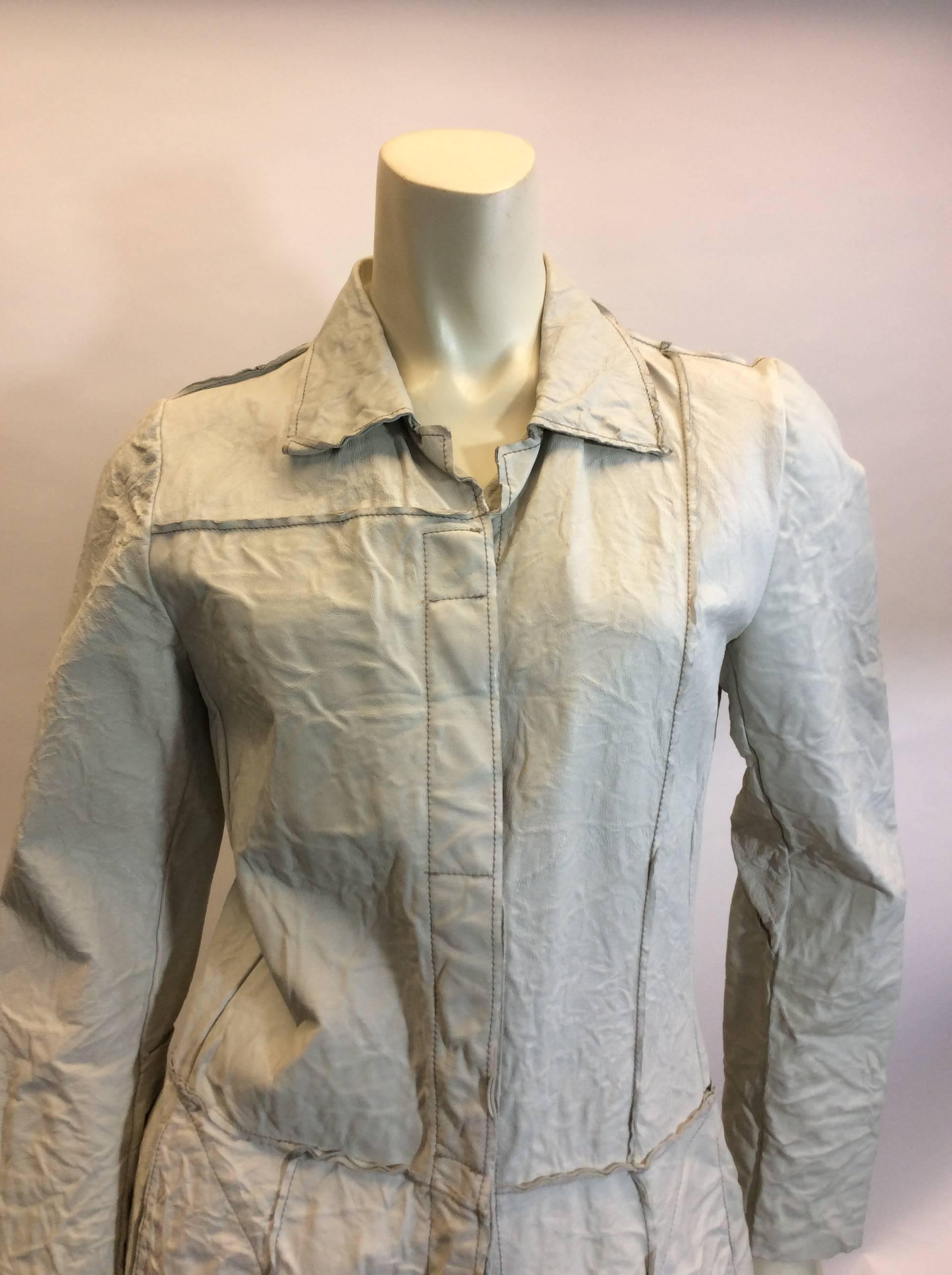 Poleci Cream Crinkle Leather Jacket
Crinkle leather
Made in the USA
Two front pockets
Button closures
Size 6
$199