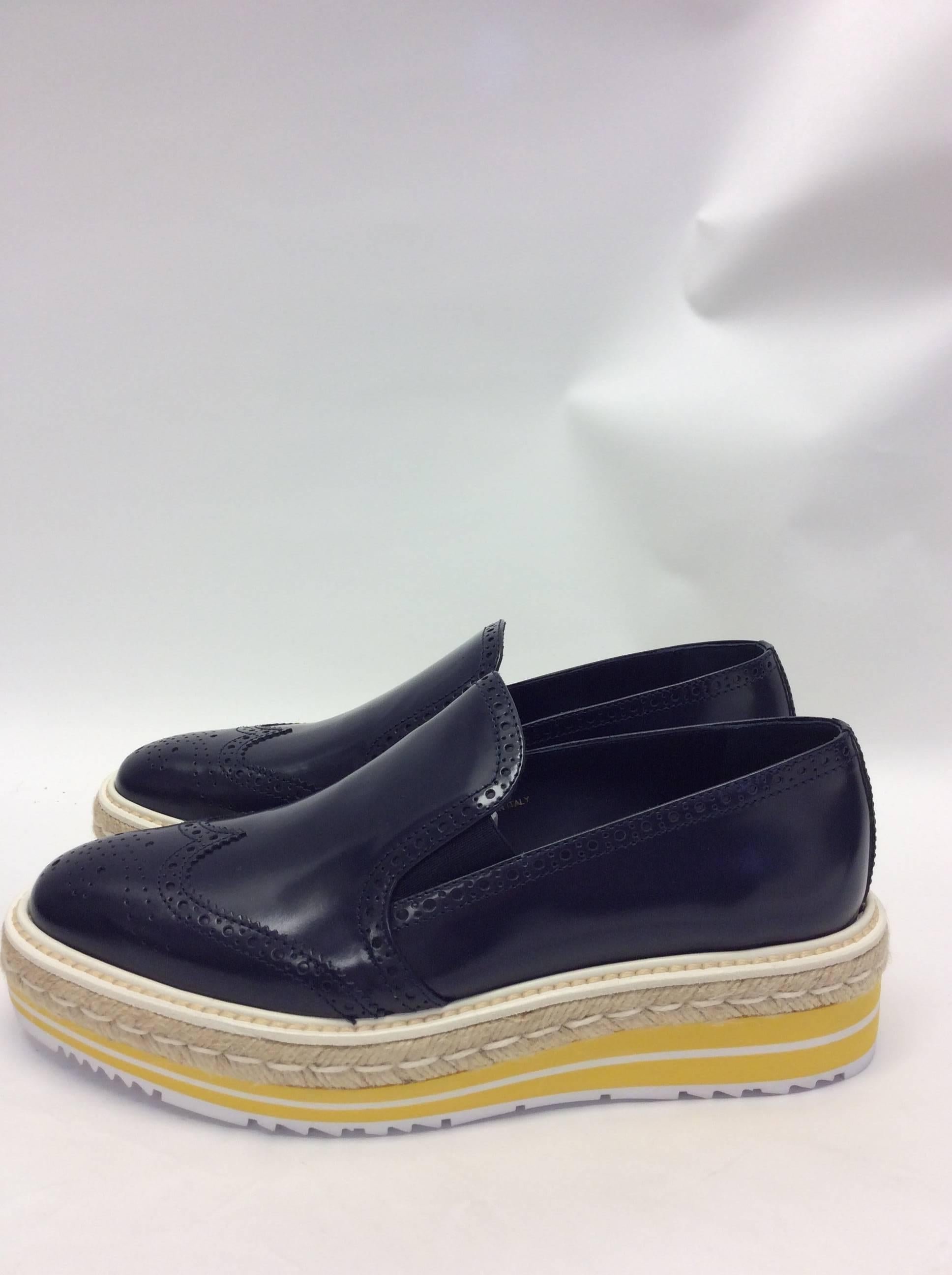 Prada Navy Leather Espadrille NIB Oxford
Size 39
Foam platform with espadrille style
New in Box
Made in Italy
$299