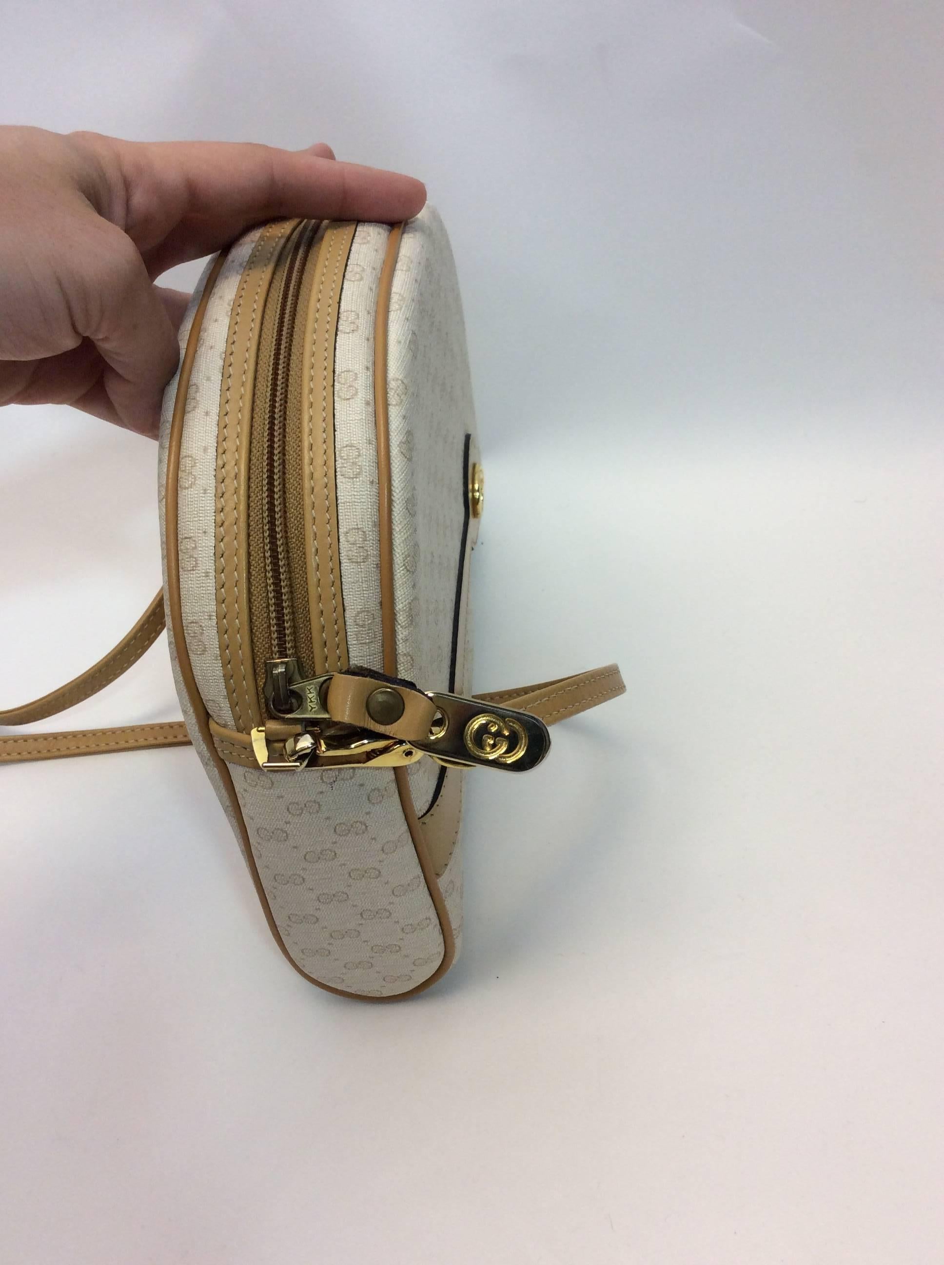 Gucci Vintage Crossbody Bag
Top zip around style
Cream logo print
Tan leather trim
$225
Made in Italy