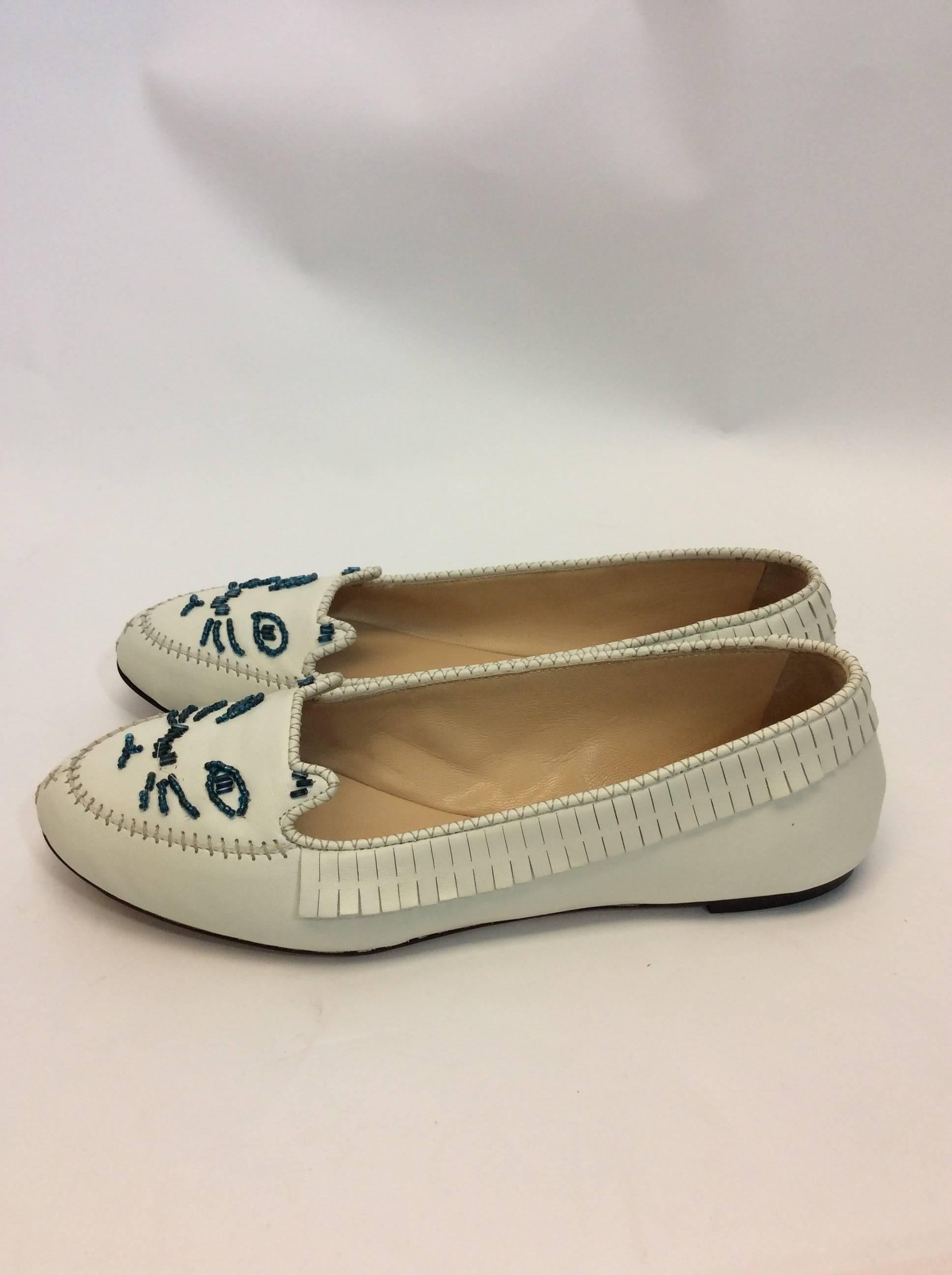 Charlotte Olympia Leather Moccasin Style Flats
$150
Made in Italy
Size 37
Blue beading showing cat design