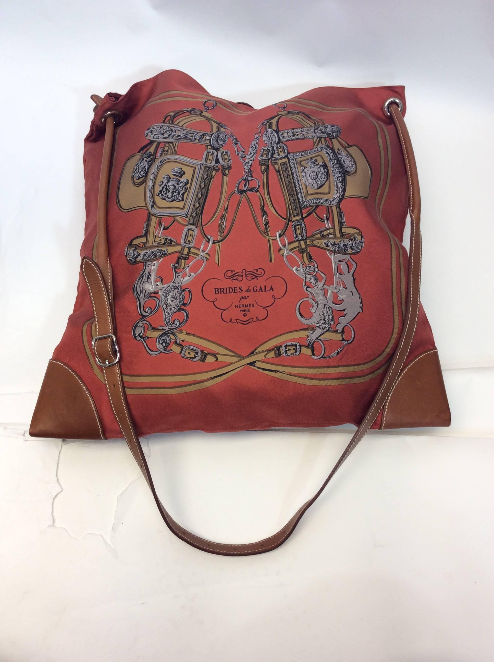 Hermes Silky City Silk And Leather Crossbody
Brides De Gala silk print
Open top closure 
Strap drop: 17 inches
Made in France
$999