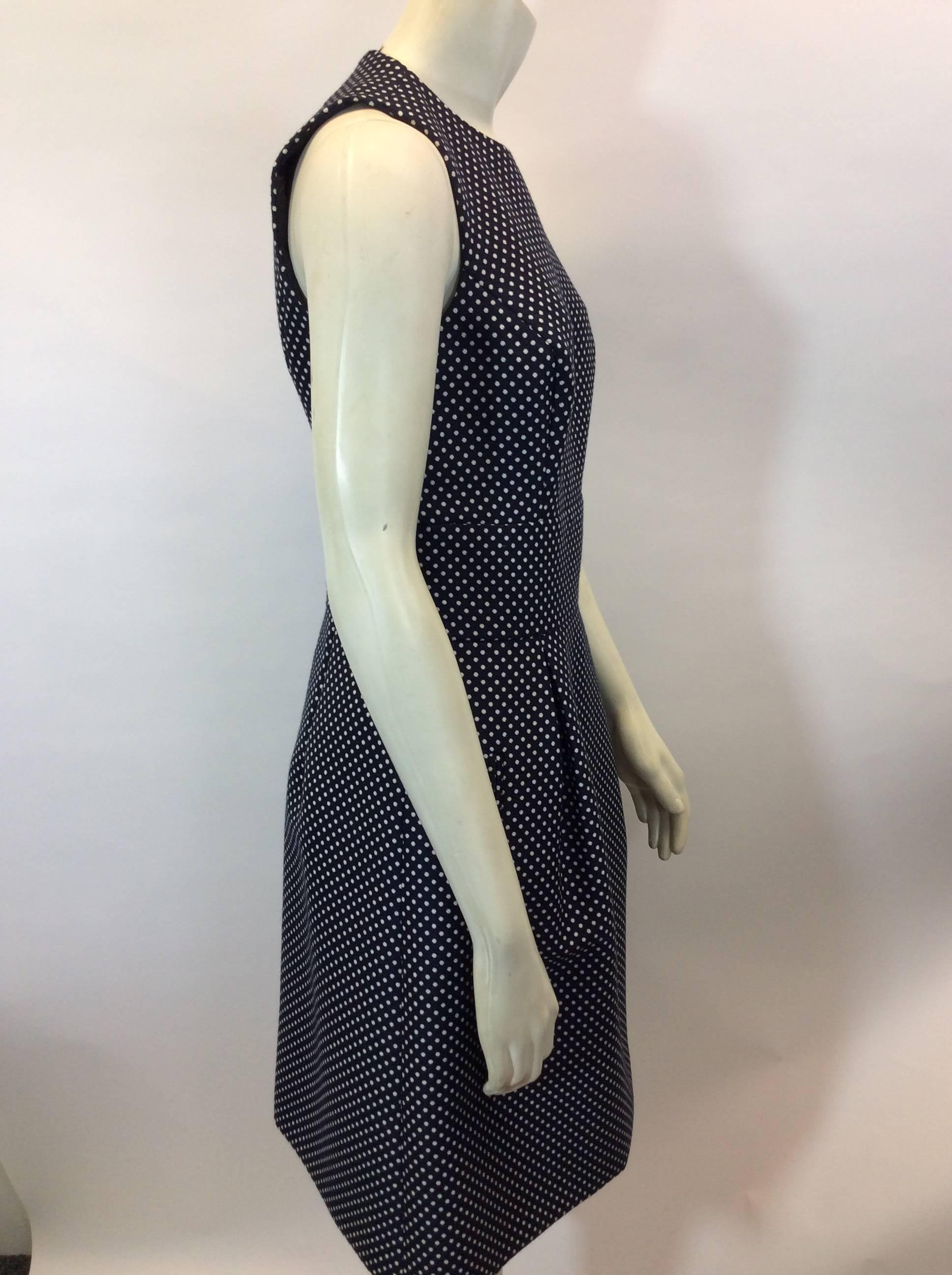 Michael Kors Polka Dot Wool Dress 
Made in Italy
Size 6
2 front hip pockets, fully lined interior of dress
$150
100% wool