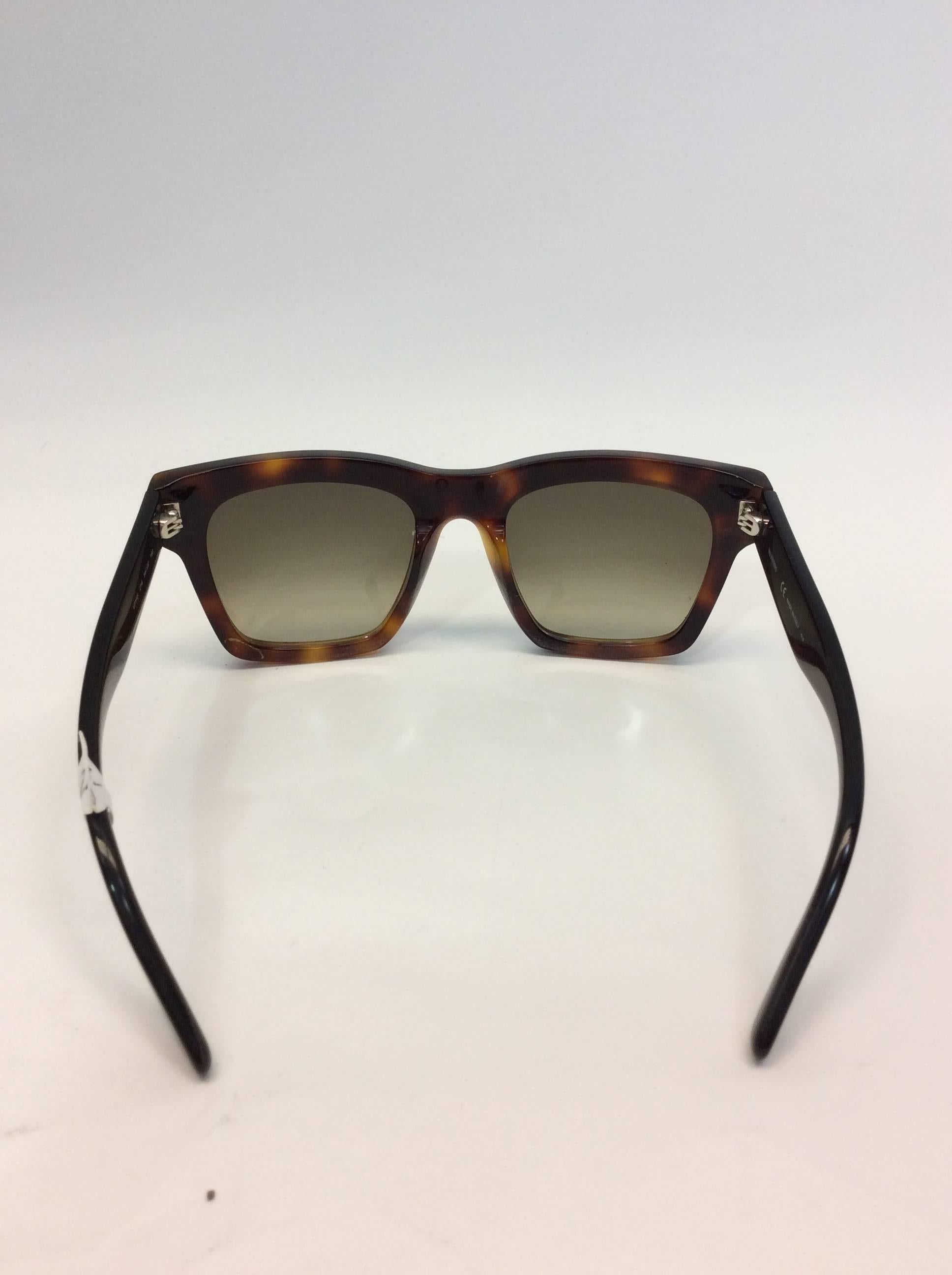 Valentino Tortoise Rockstud Square Sunglasses
Made in Italy
$225
Features Valentino's iconic rockstud integrated on the front frame
6.5 inches in length, 2.5 inches height
Comes with Valentino case
