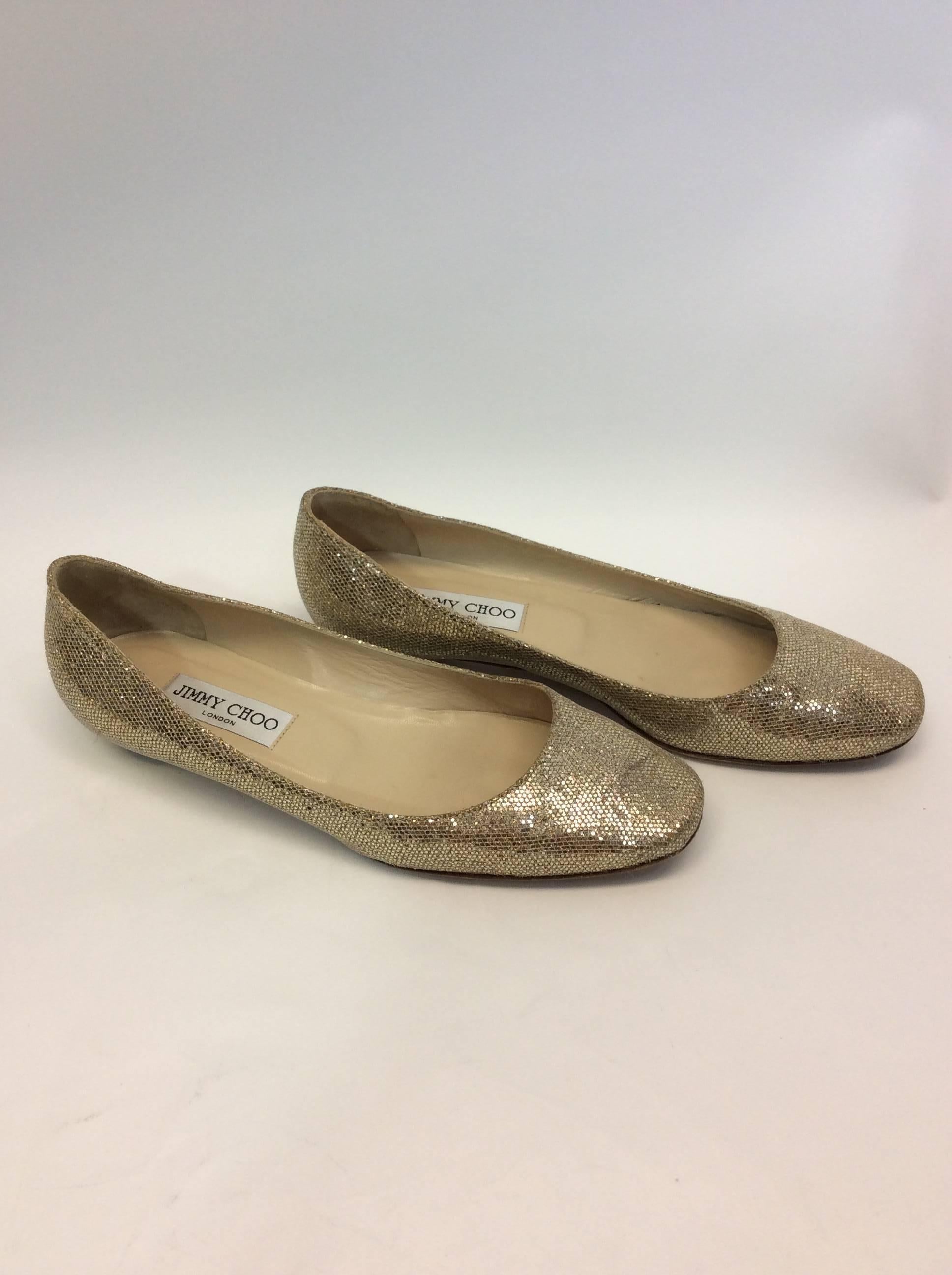 Jimmy Choo Gold Shimmer Metallic Flats In Excellent Condition For Sale In Narberth, PA