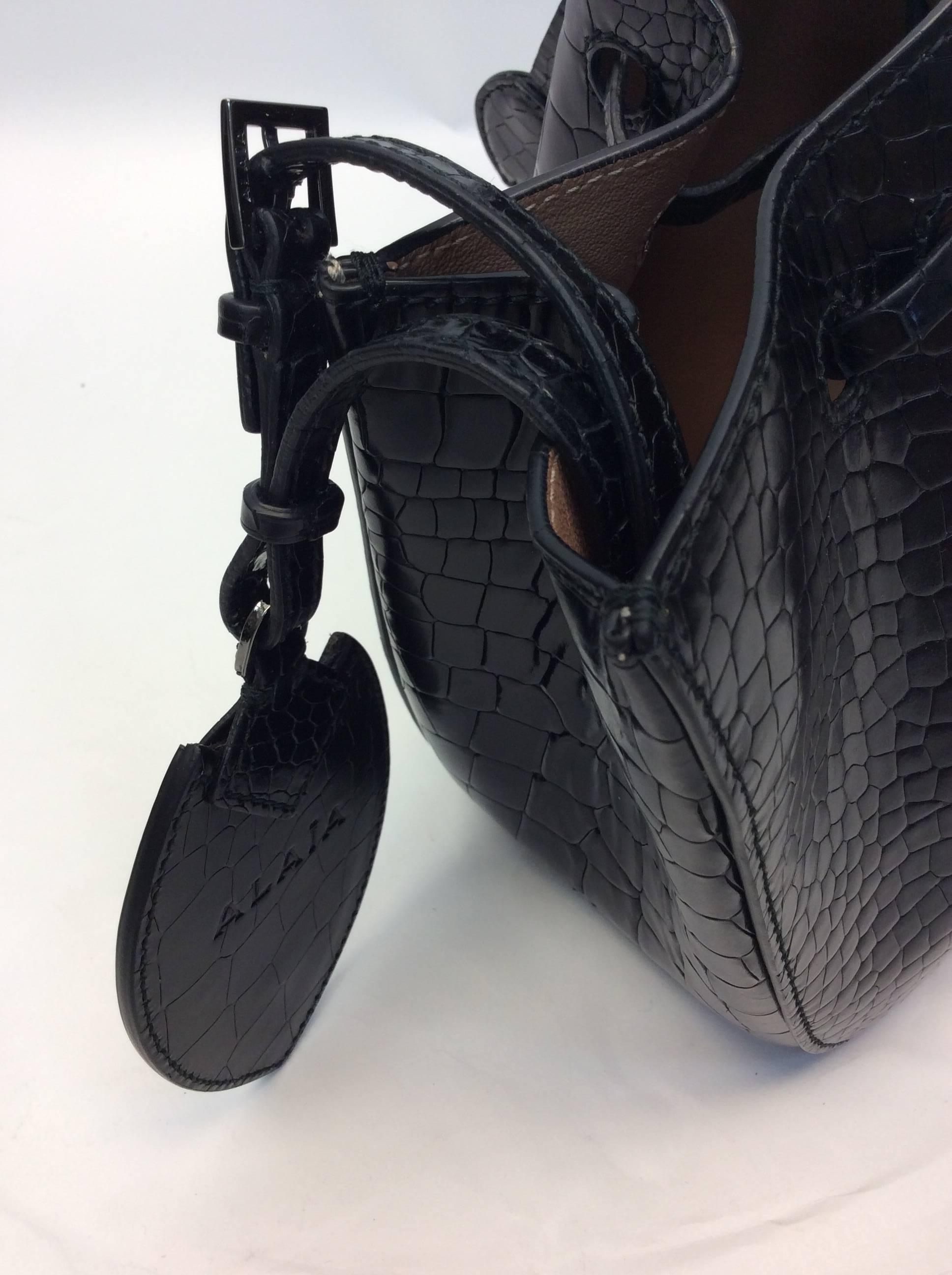 Alaia Black Alligator Embossed Wristlet Bucket Bag 1