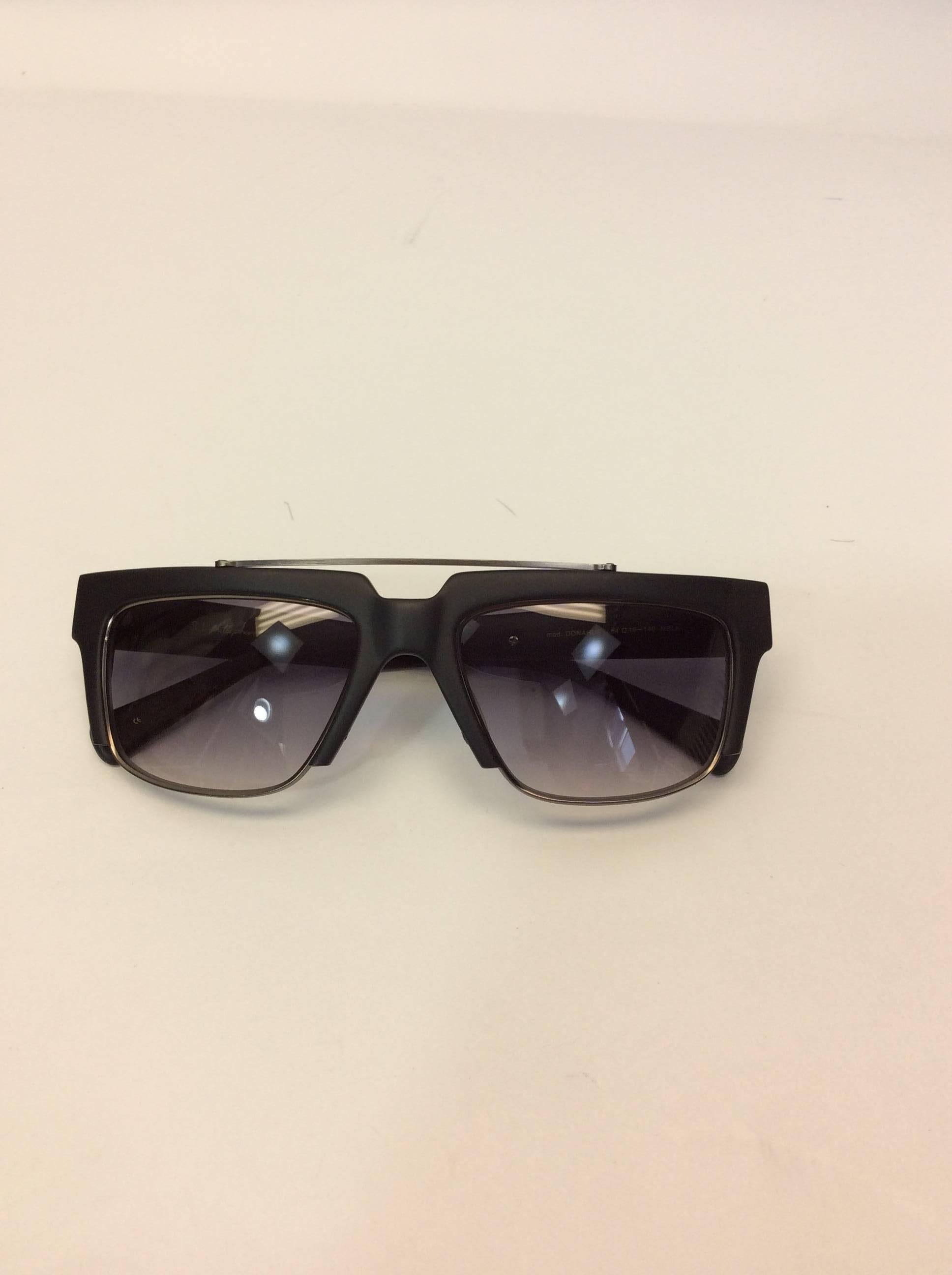 Phillip Lim Donahoue Mod Black Square Sunglasses
Comes with case
$165
Silver metal top detail on the the frame
