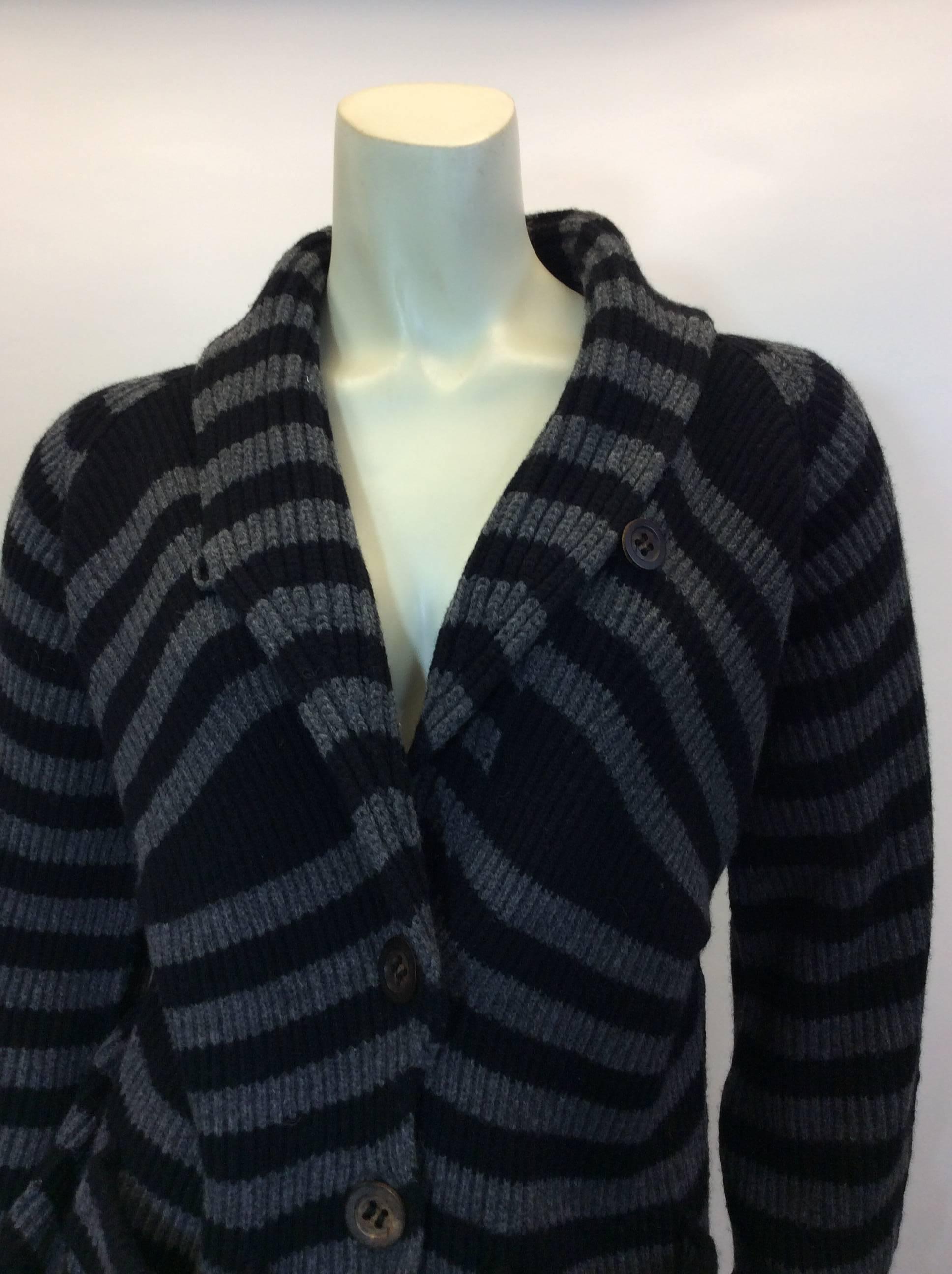 Sonia Rykiel New Wool Striped Sweater
90% wool, 10% cashmere
Size 40
Made in Italy
Never worn, Our price: $199
Button up style with cowl neck
