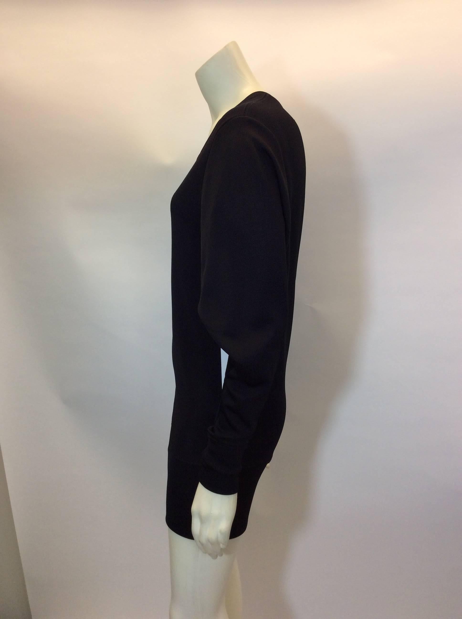Helmut Lang Black Long Sleeve NWT Dress
Size X-Small
Slouchy sleeve style
$225
87% viscose, 9& poly, 4% elastane
All black with banded bottom hem
Made in the USA