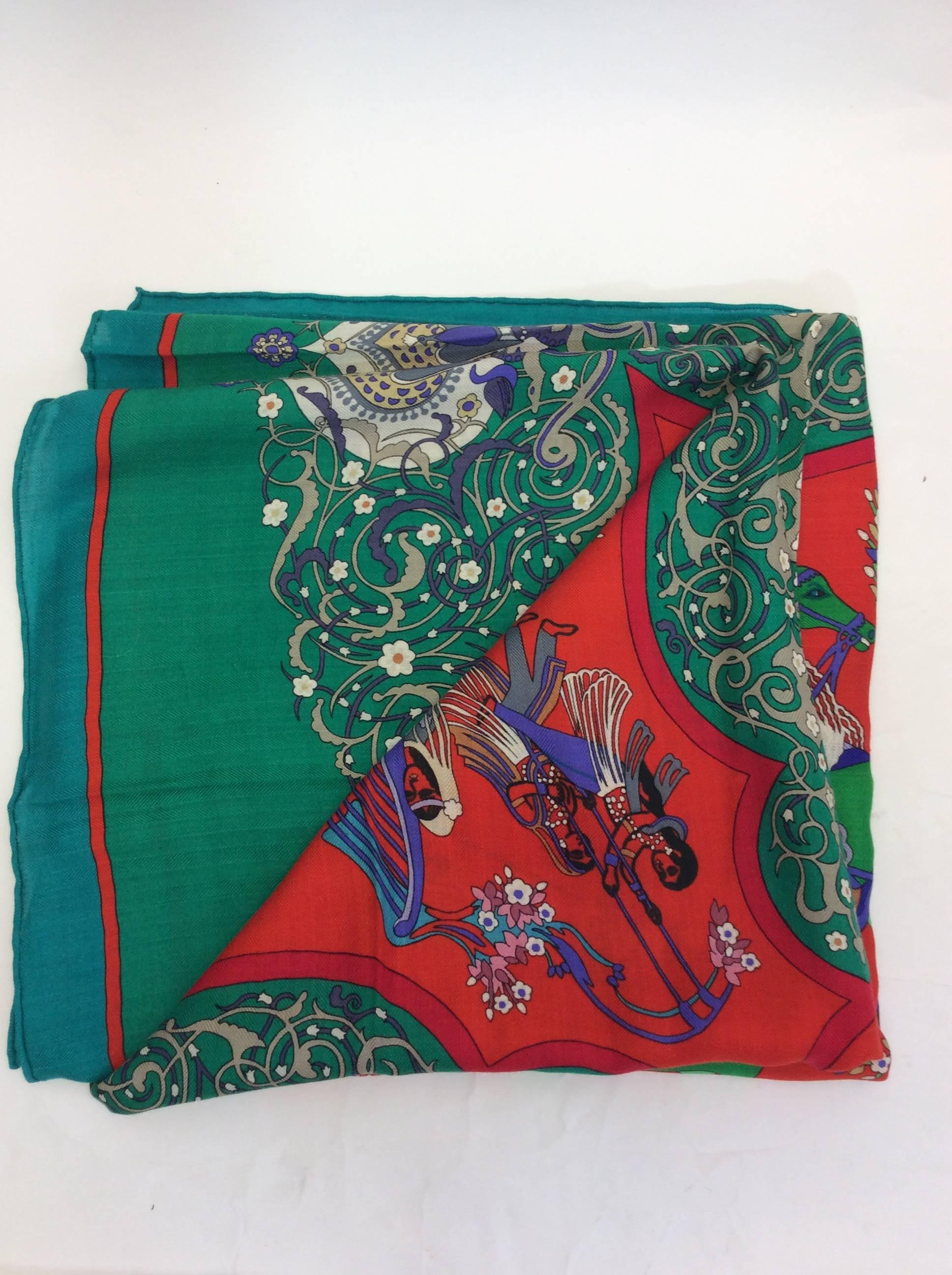 Red And Bright Green Printed Scarf
53 x 53 inches
Bright floral and equestrian design
65% Cashmere, 35% Silk