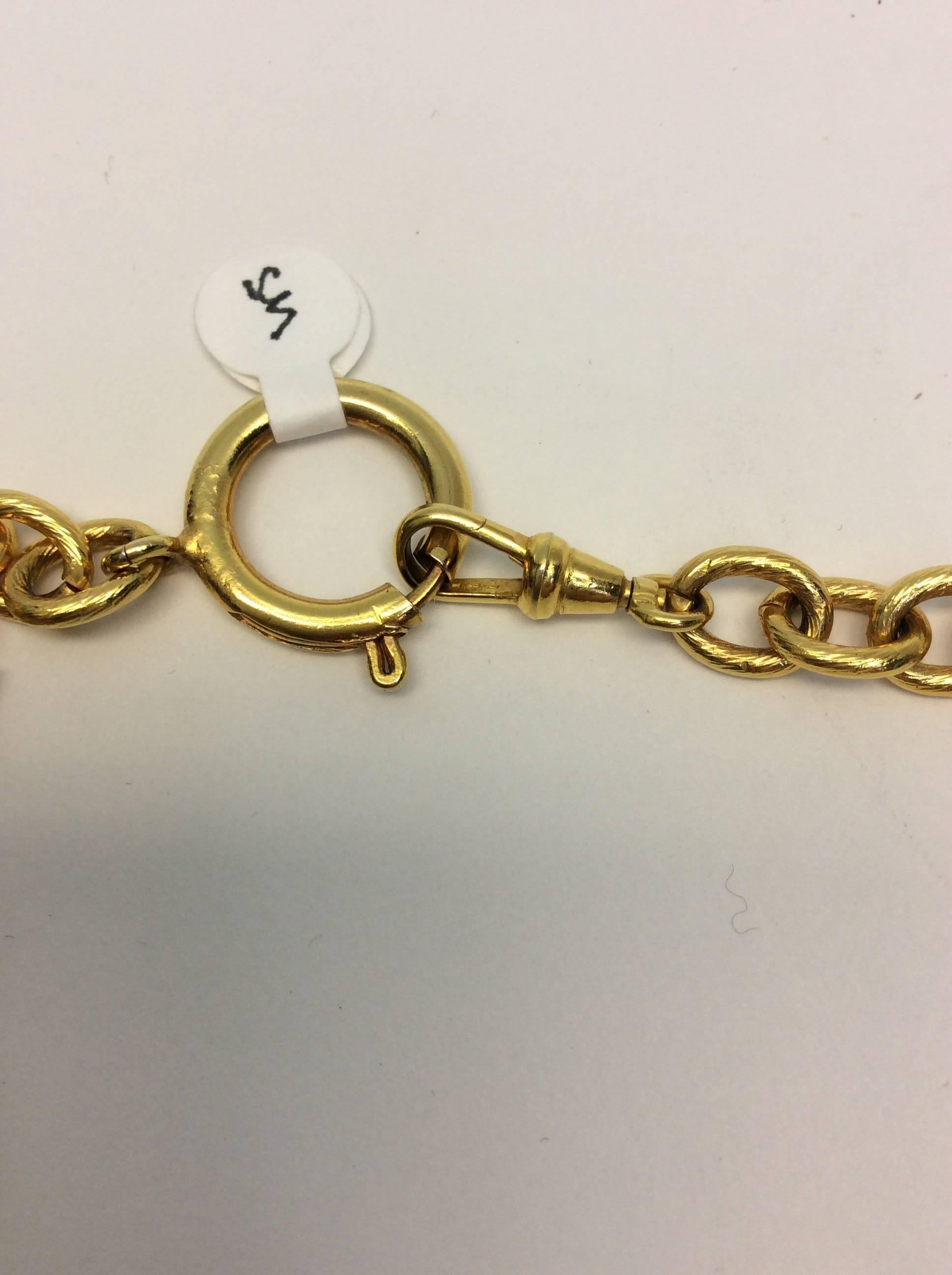 Brown Chanel Gold Plated Charm Necklace For Sale