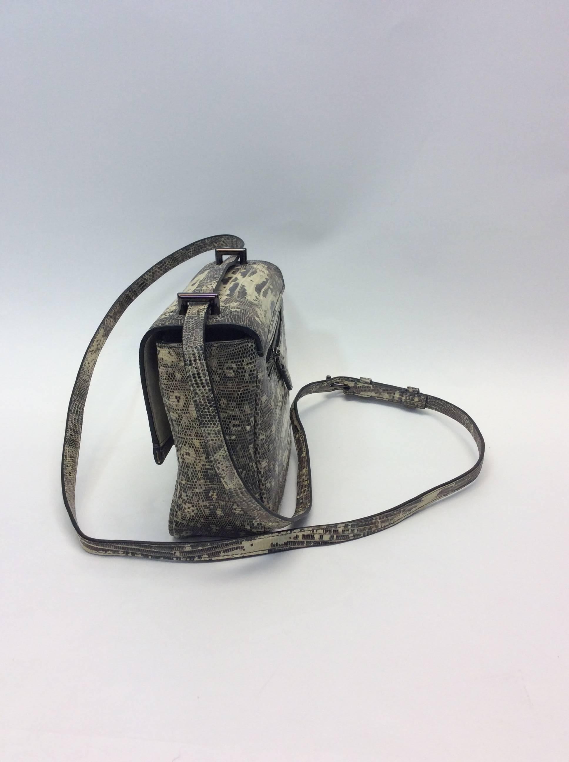 Reed Krakoff Mini Lizard Crossbody 
Style # 17267
Retail price: $2,490
Tejus lizard skin. Black nickel hardware
Convertible and adjustable shoulder strap
Internal zipper pocket & interior fully lined with twill fabric
Origin unknown
$1,100