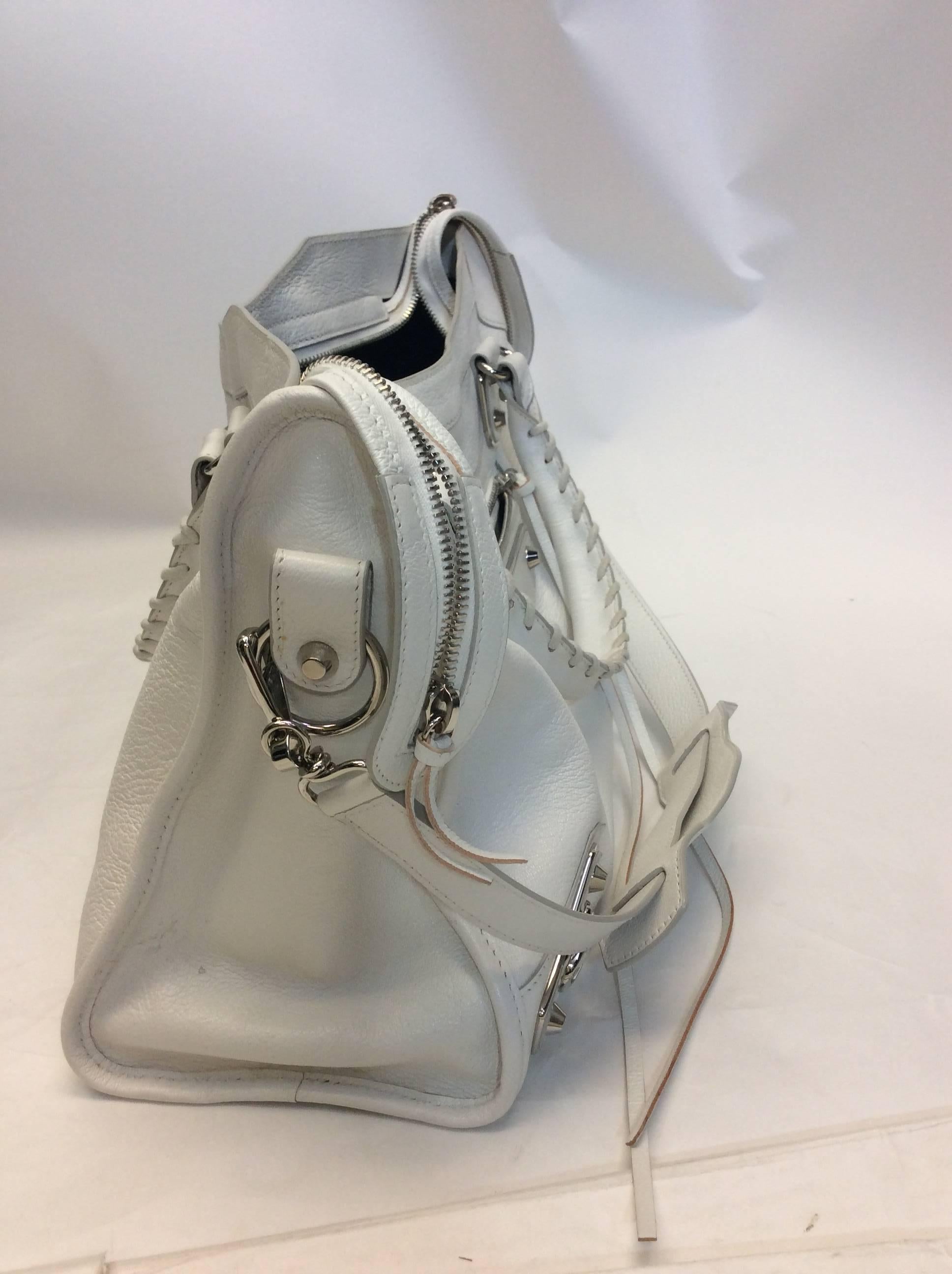Balenciaga White City Bag NWT 
NWT, $2125
Our price: $799
Crossbody option included
Silver hardware, comes with mirror
Very small stain on the exterior side - see photo