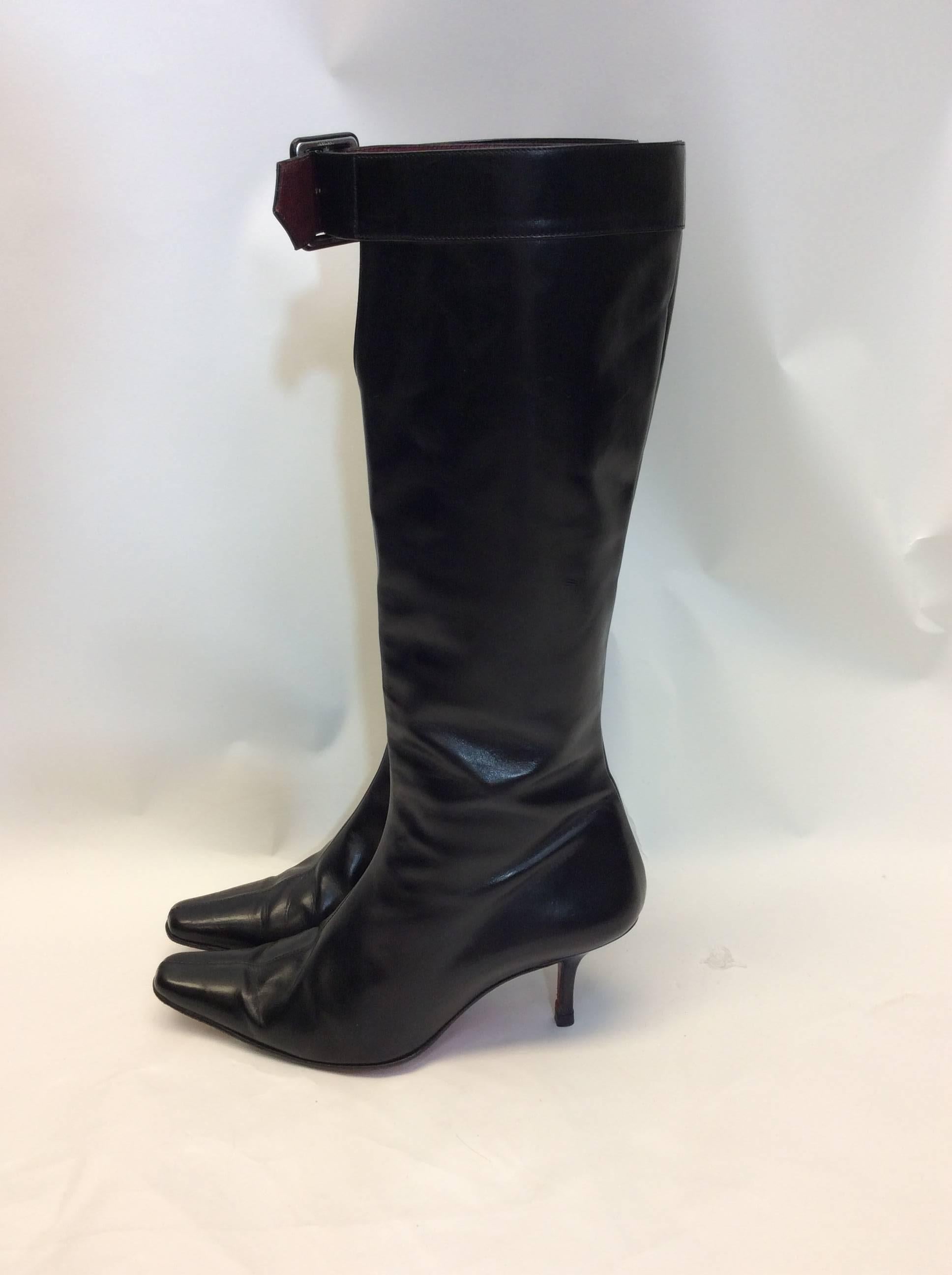 Christian Louboutin Black Leather Buckle Boots
$250
Size 36.5
2.5 inch heel size zipper and top front buckle 
Made in Italy
**signs of wear on heels, see photo
