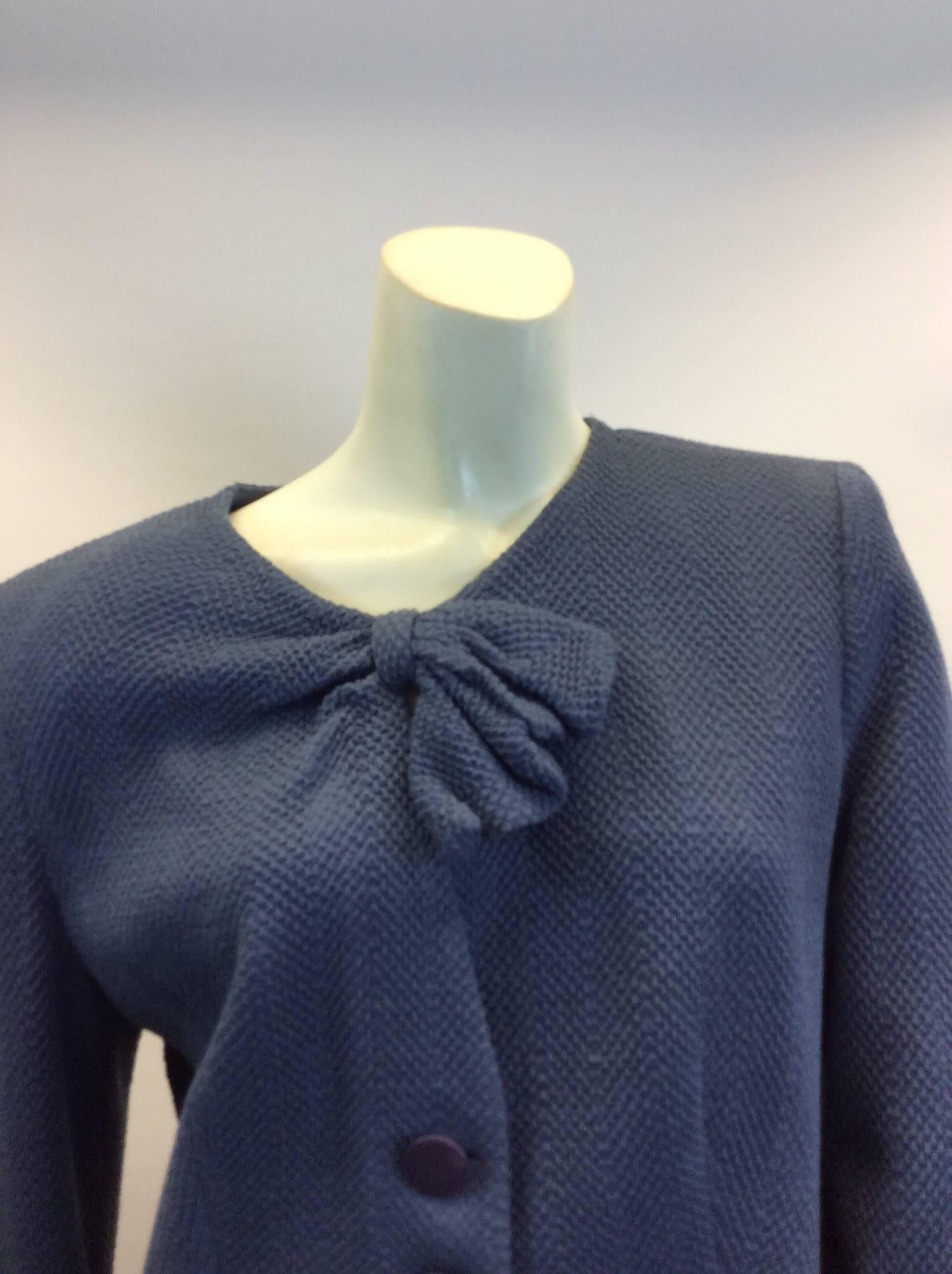 Armani Blue Bow Jacket
$136
Made in Italy
36% viscose 28% wool 27% acrylic 8% nylon 1% elastane
Bow detail at neck
