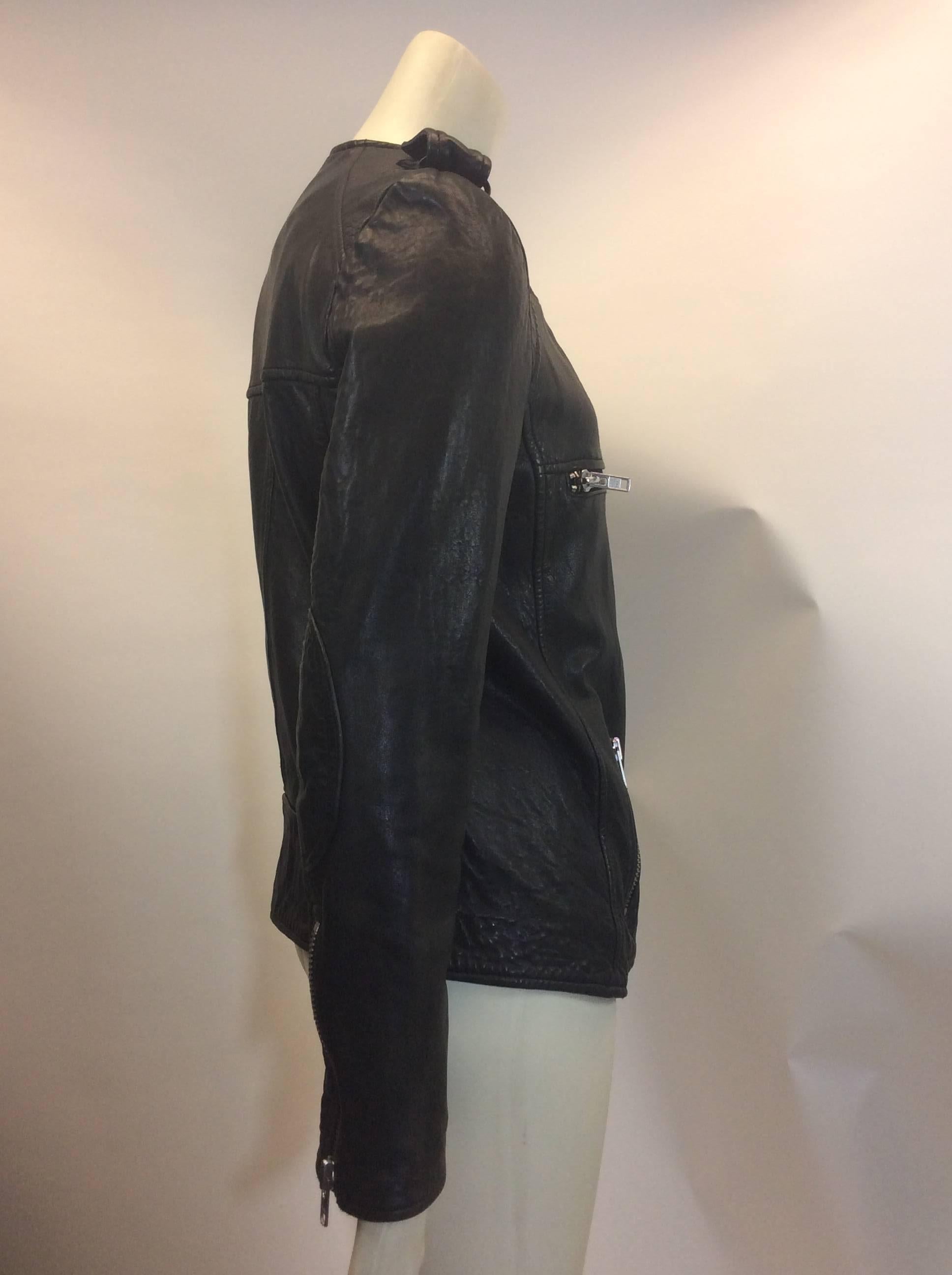 Isabel Marant Leather Moto Jacket 
Made in India
Size 36
$499
100% lambskin
Fully lined interior
Longer in the front, shorter in the back
