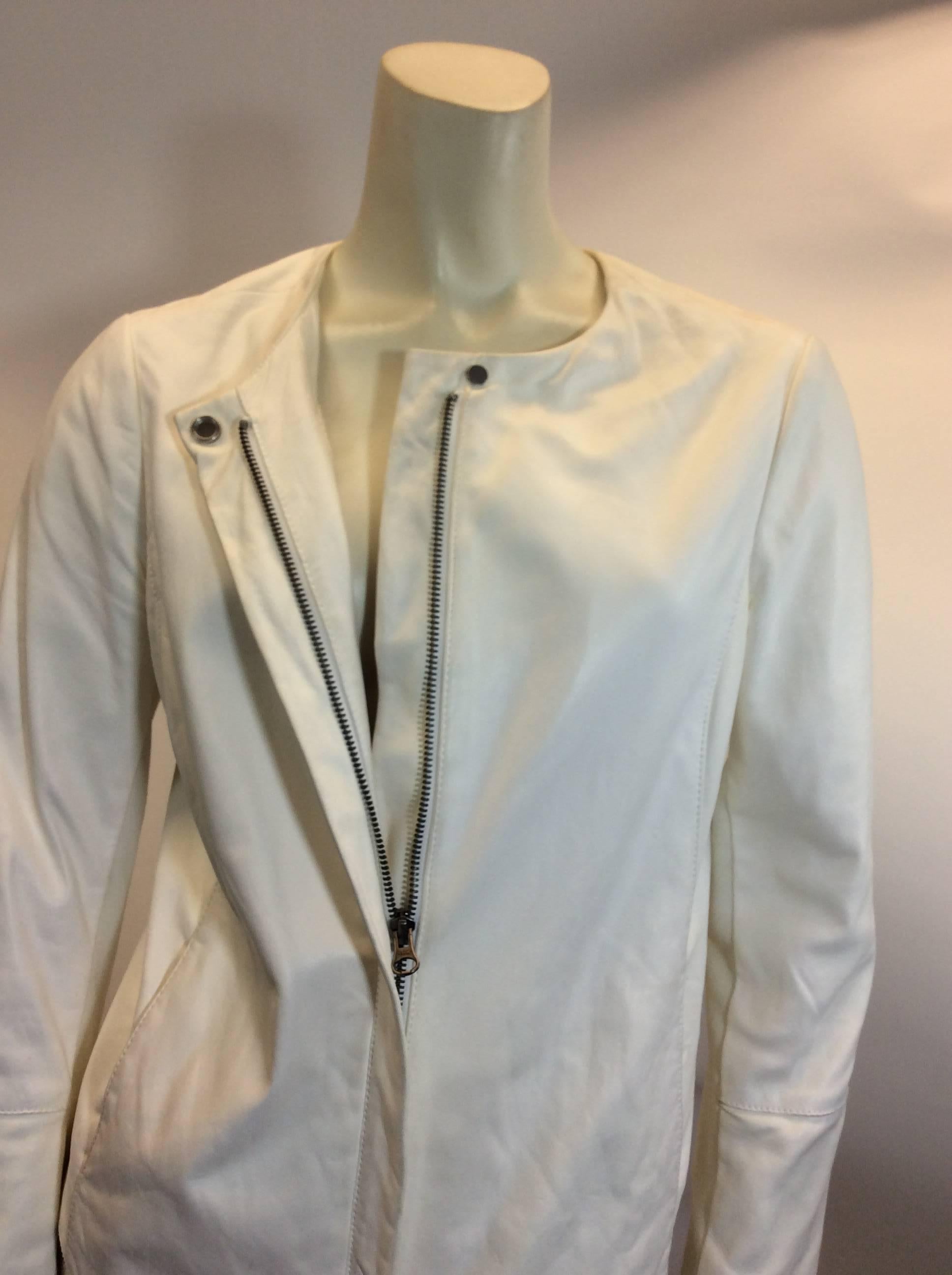 Vince White Leather Zip Up Jacket
$350
Size medium
100% leather exterior, 100% silk interior lining
Zip up style with top snap
Made in China
Very small mark on shoulder, see photo