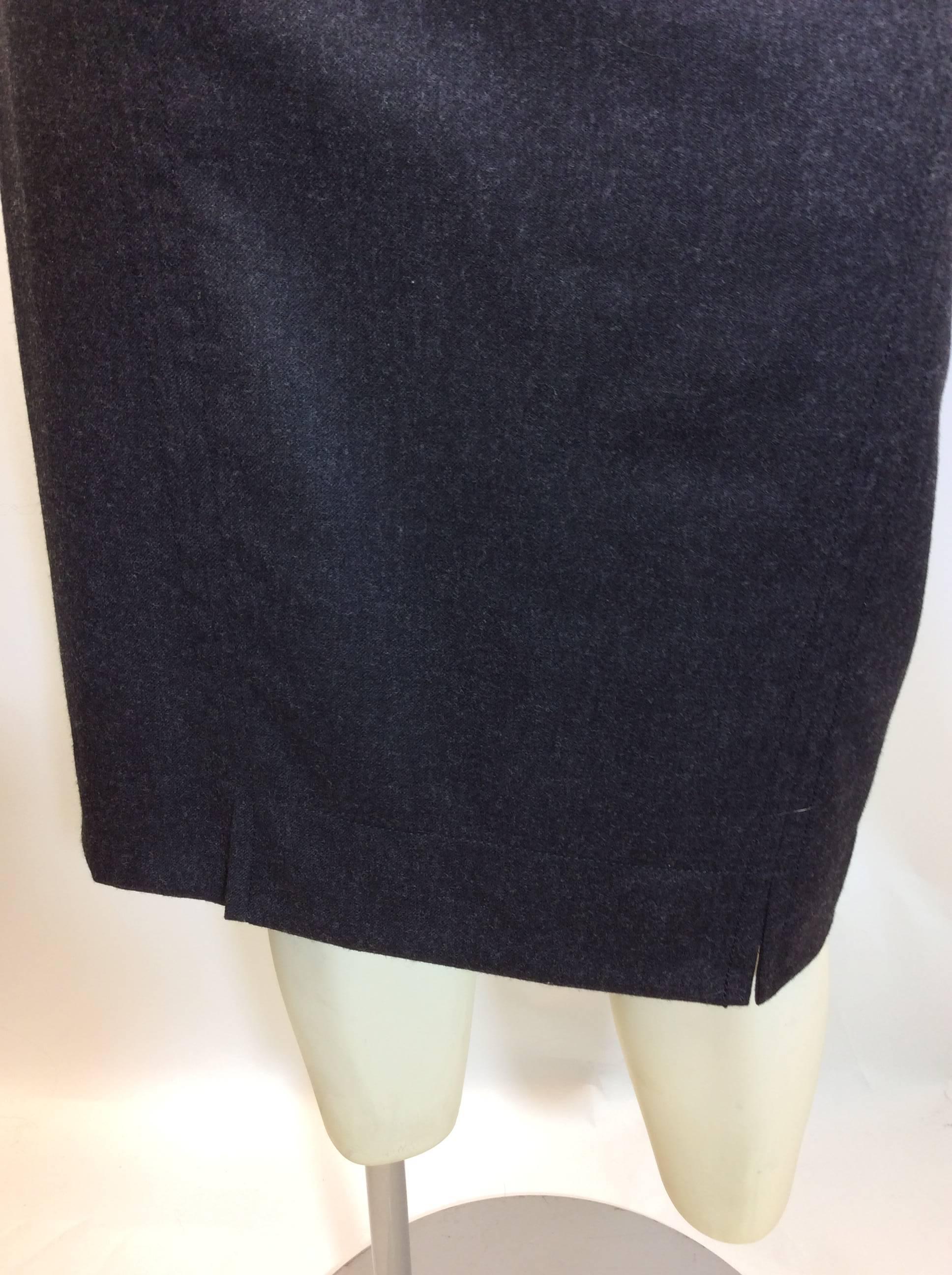 Akris Punto Gray Skirt
Two mini side slits in front and back
Size 8
Interior fully lined
$199