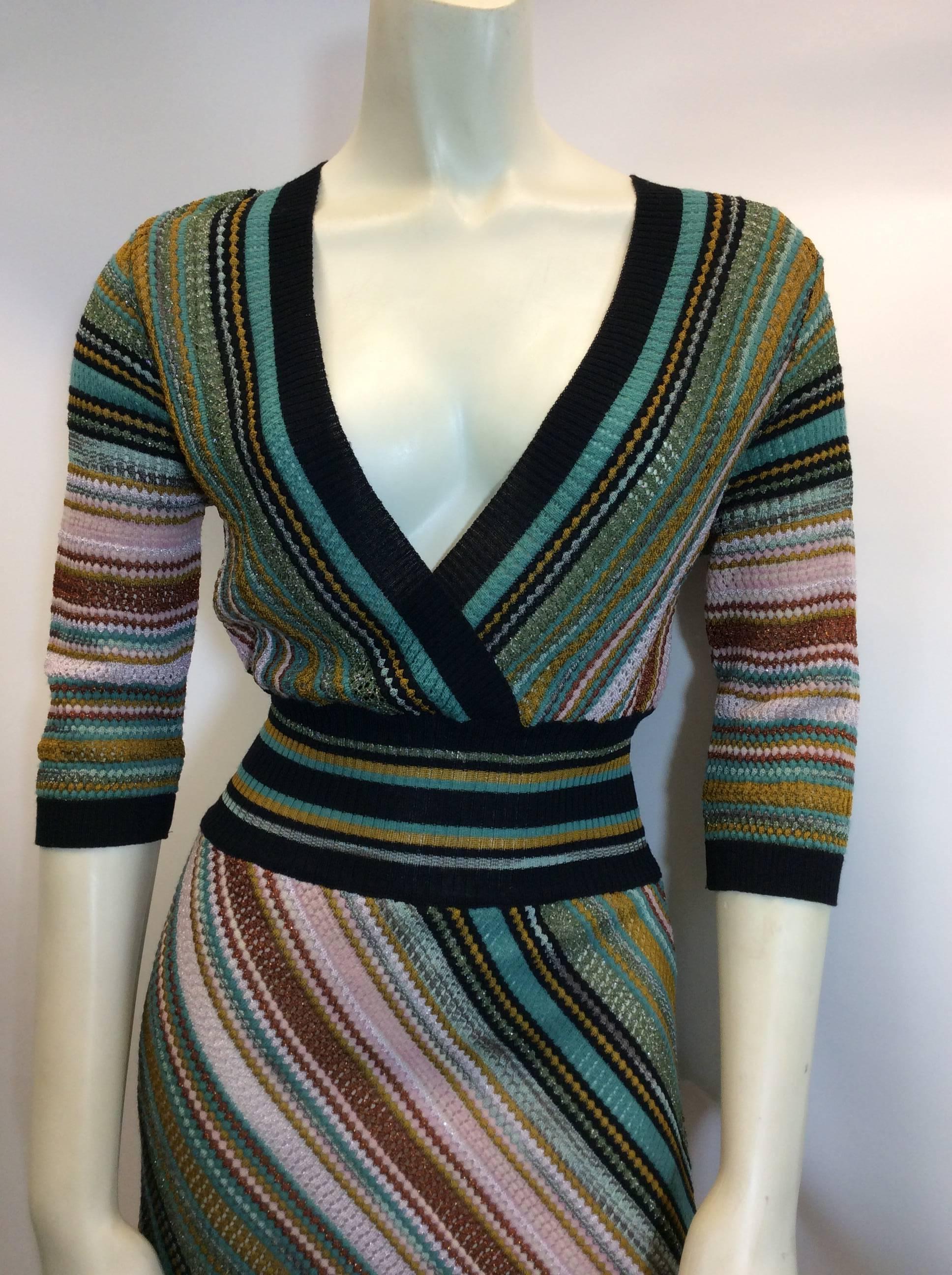 Missoni V Neck Striped Dress
Made in Italy
$250
Skirt portion of dress is fully lined 
100% polyester
Shimmer effect detailing 