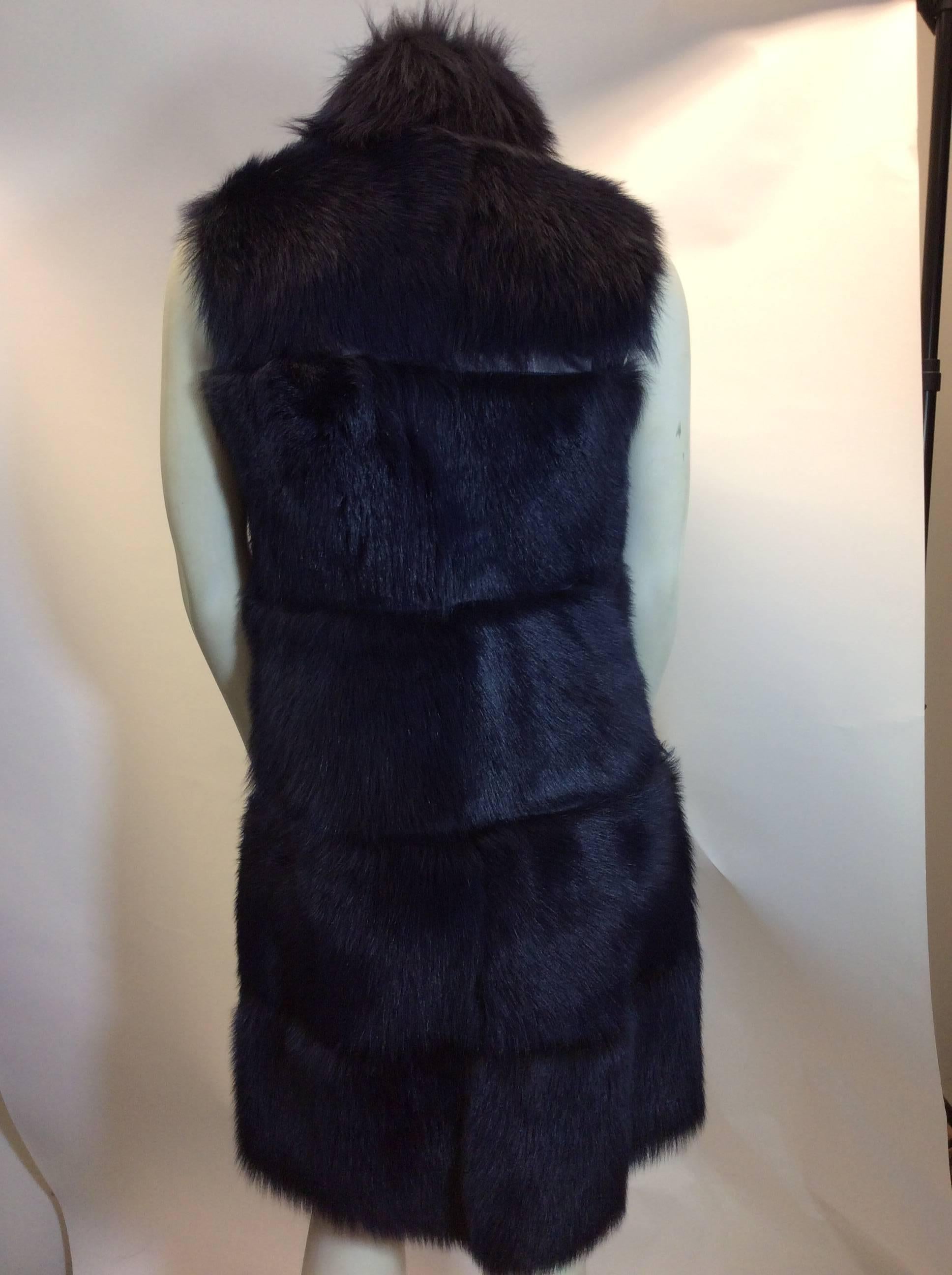 Women's or Men's Via Veneto Navy Shearling And Leather Vest For Sale