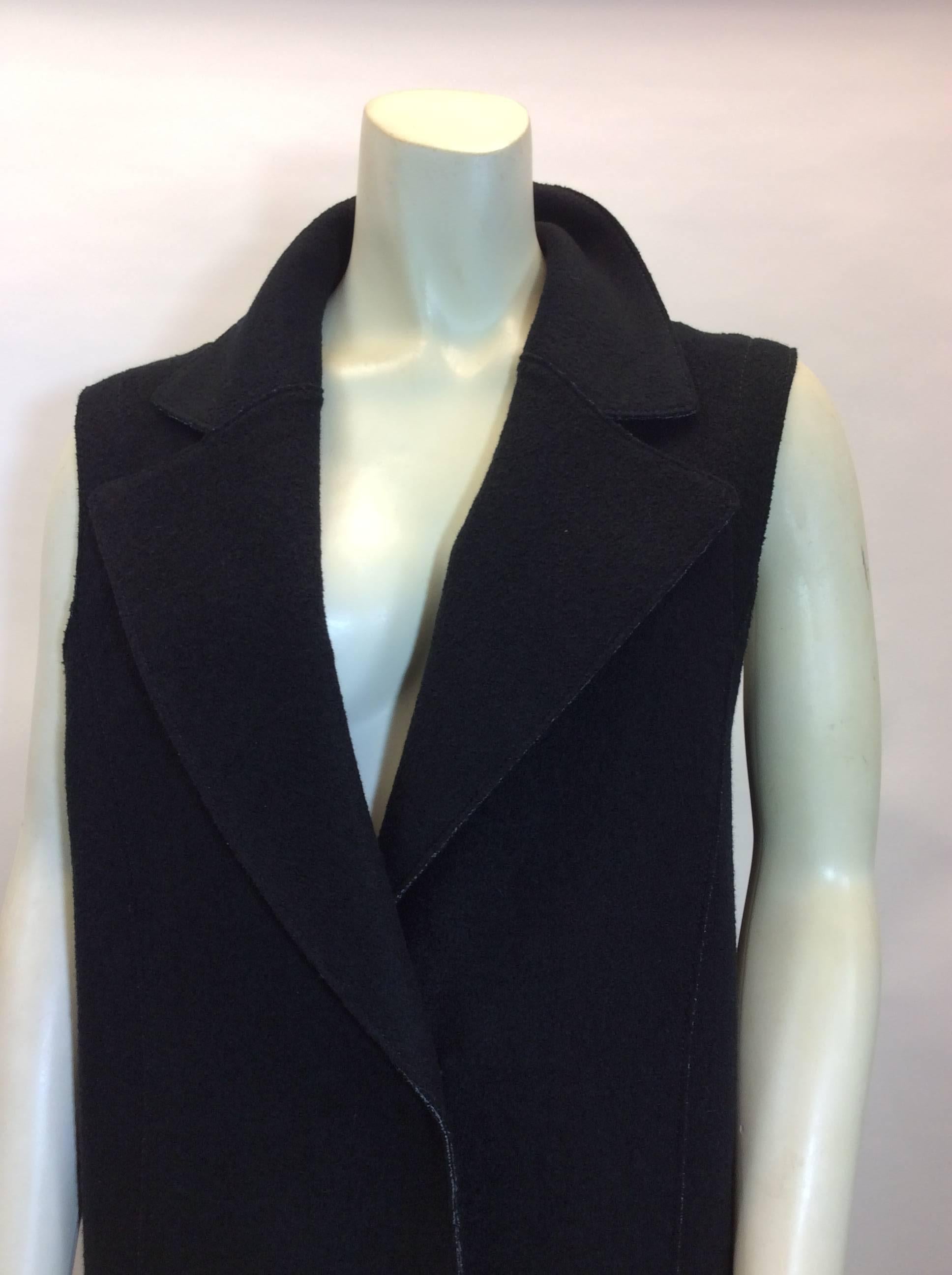 Marccain Black Boiled Wool Waistcoat
$350
Size 4
Made in Romania
87% wool, 13% polymaide
