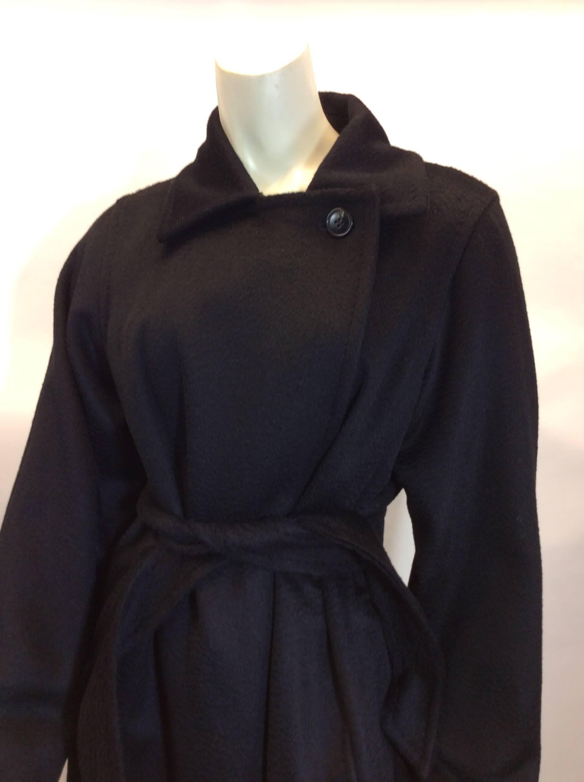 Maxmara Cashmere Black Wrap Belted Coat
$699
100% camel hair
Made in Italy
Top button closure
Two front pockets 
