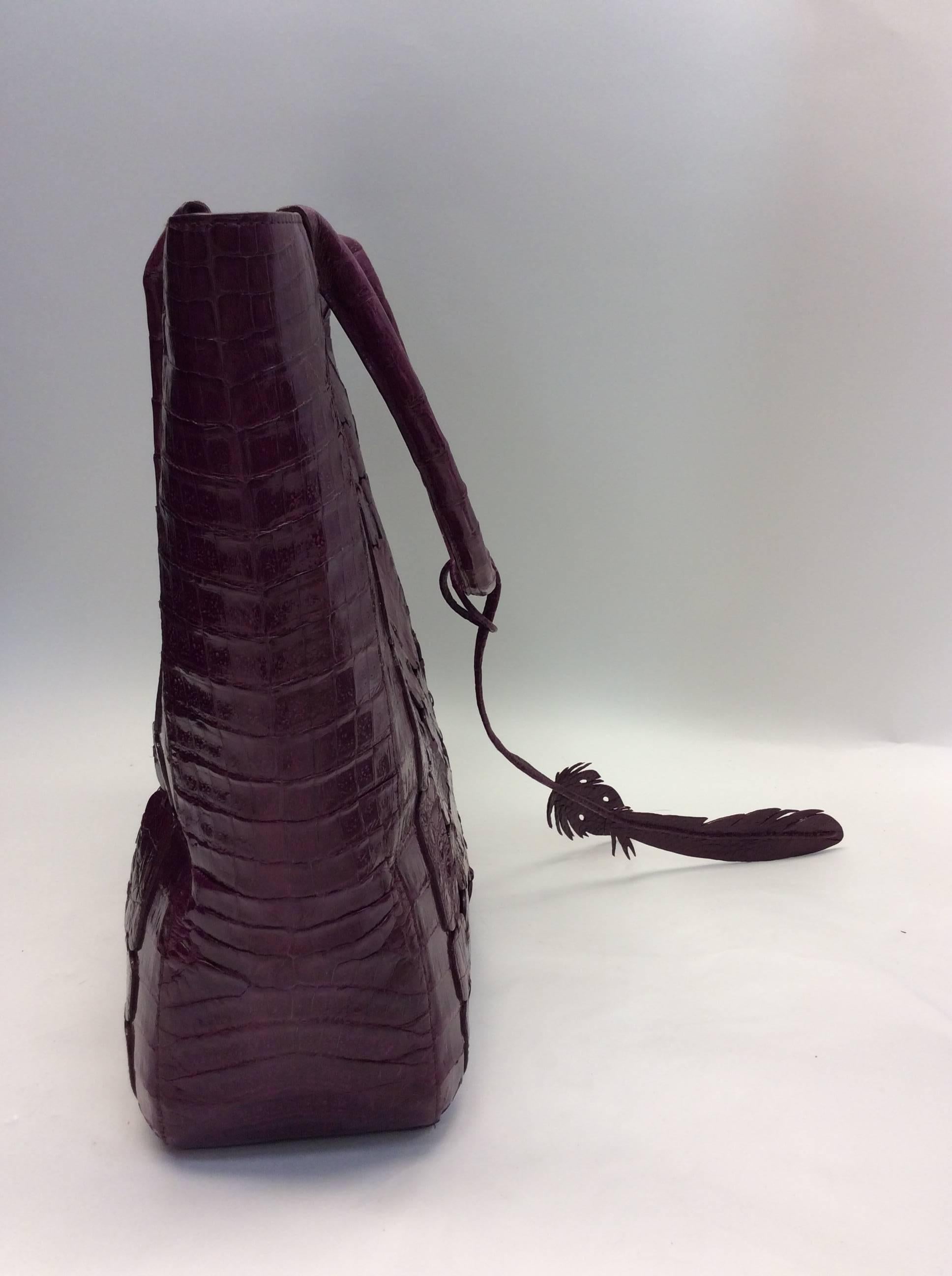 Nancy Gonzalez Large Purple Crocodile Shoulder Bag
100% genuine crocodile
Made in Columbia
$2100
