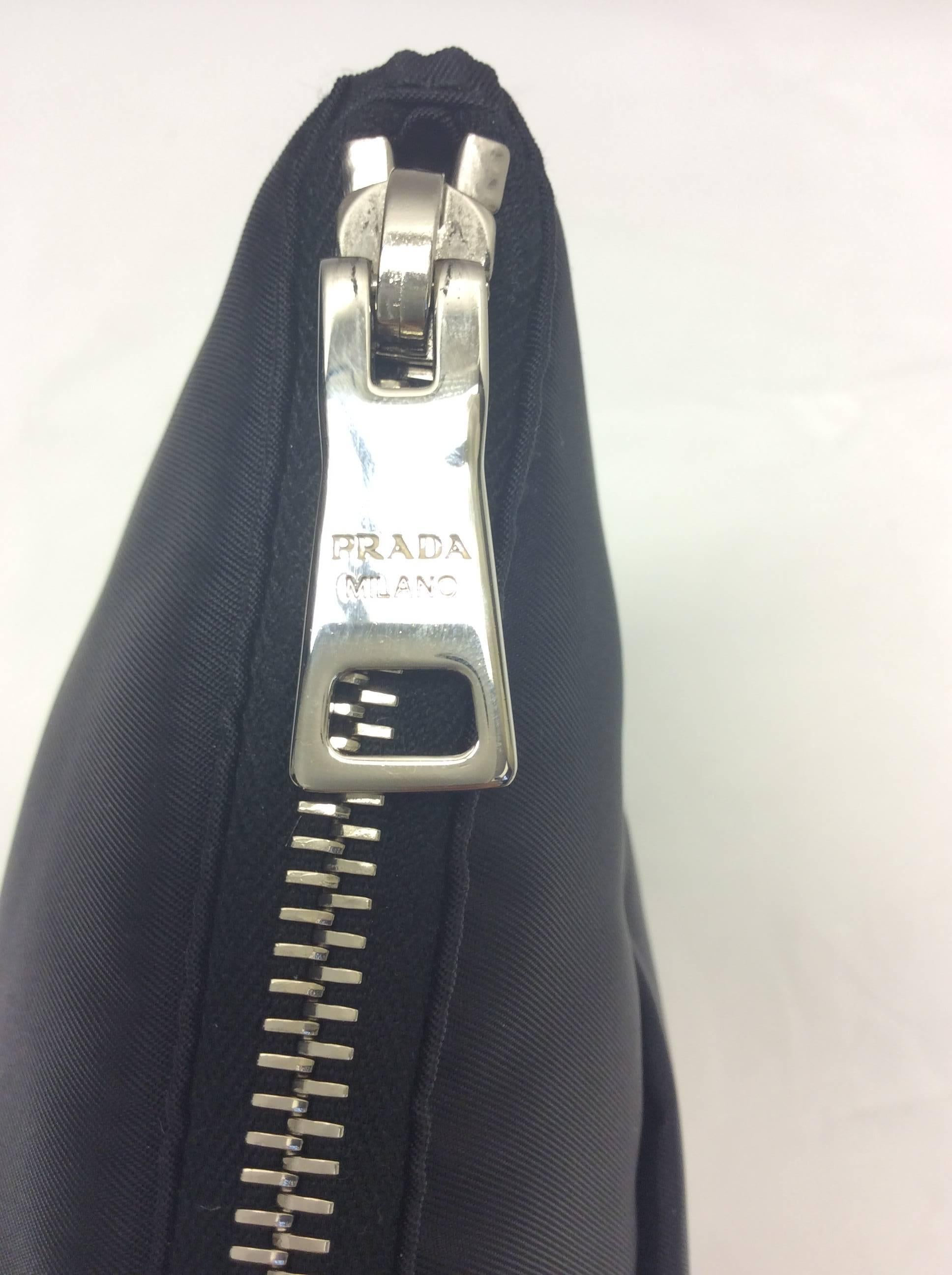 Prada Nylon Black Zipper Clutch
$699
Made in Italy
Silver hardware
Top zipper closure, front zipper pocket