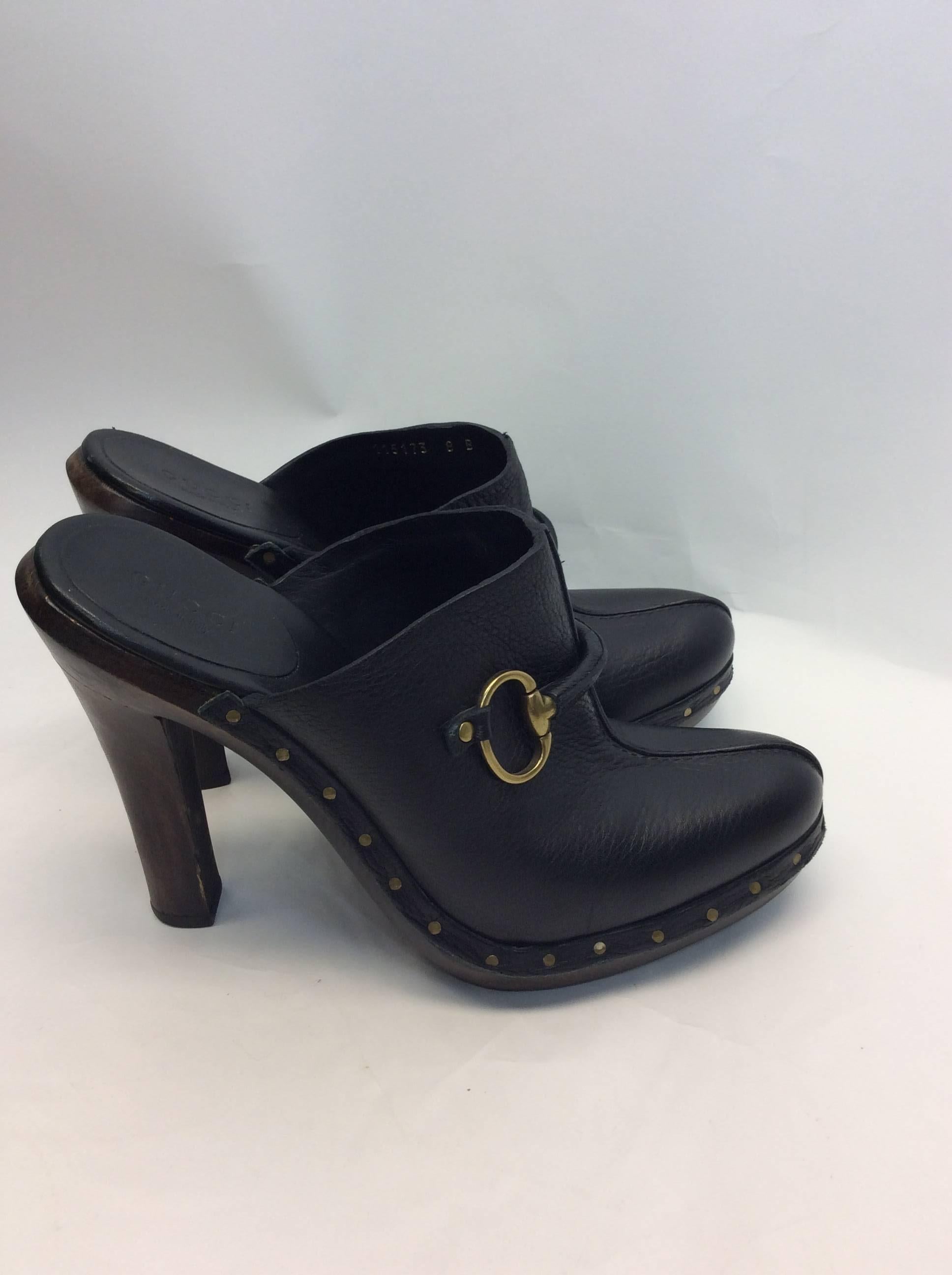 Gucci Black Leather Clog Heels
Size 8
Made in Italy
$150
Horsebit detail on the front
Wooden heel, stud trim