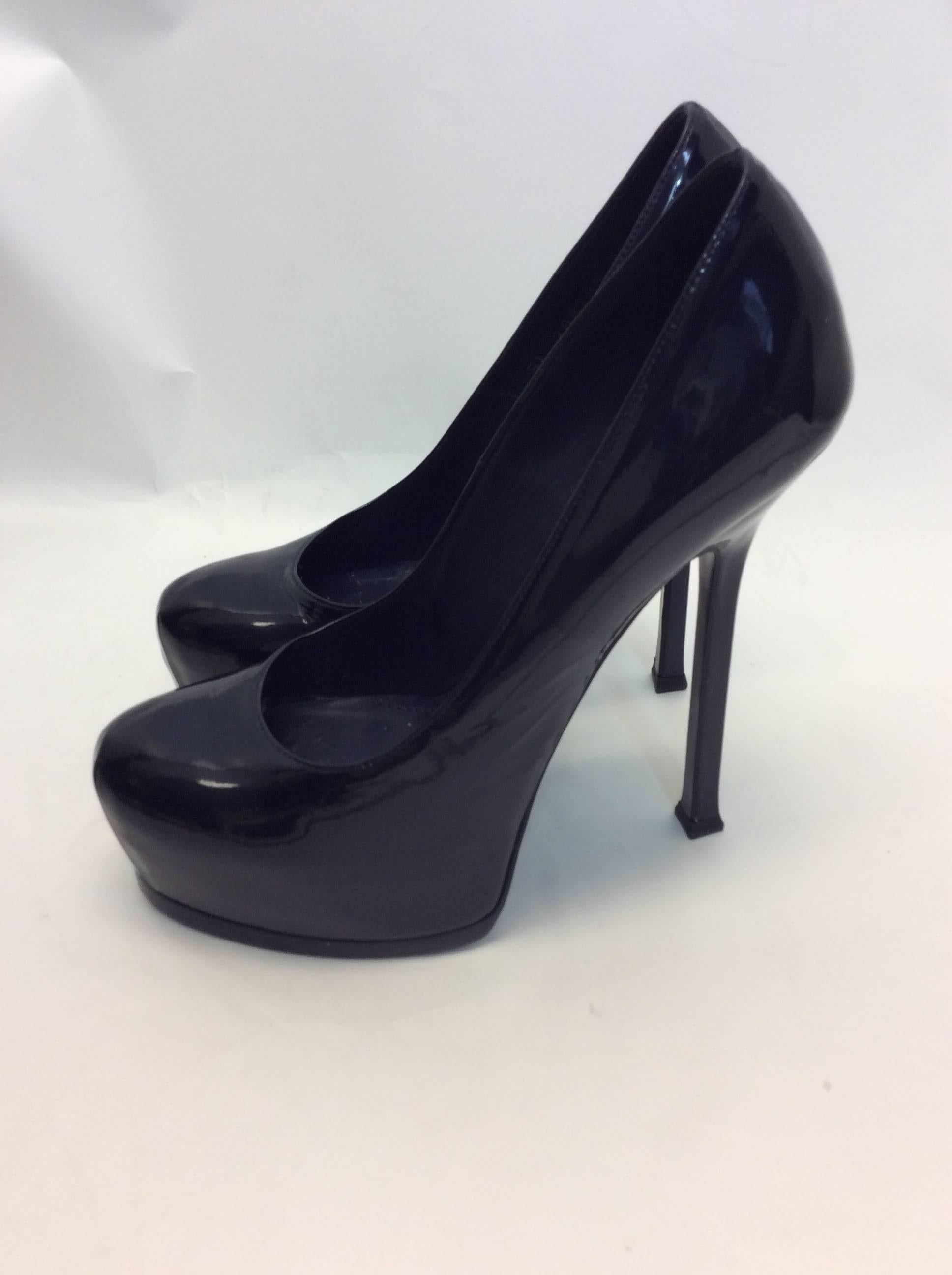 YSL Navy Patent Leather Pumps 
5.25 heel
Made in Italy
Size 37
$350
