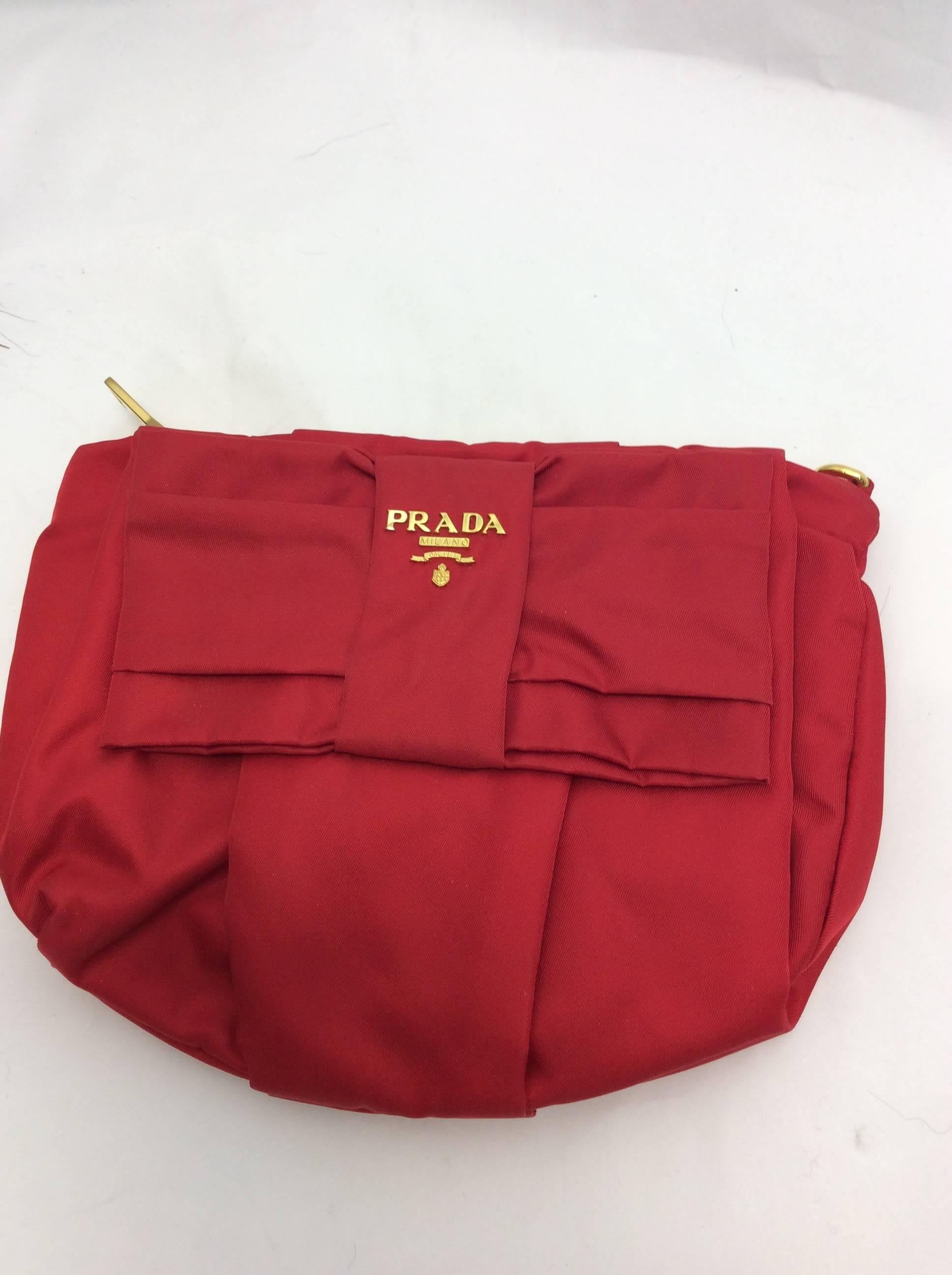 Prada Red Nylon Zipper Clutch
$150
Made in Italy
Gold toned hardware
