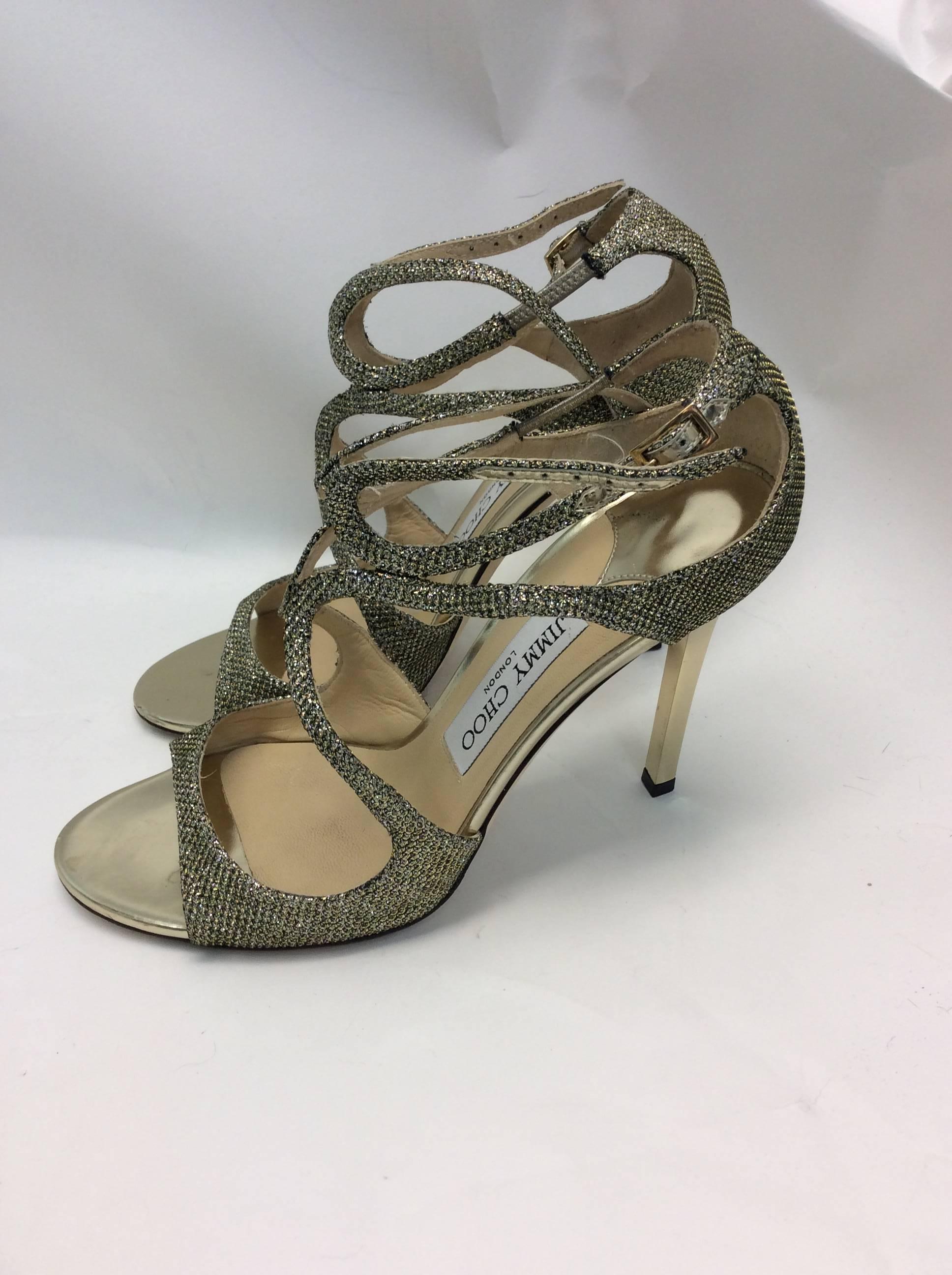 Jimmy Choo Glitter Strappy Heels
4 inch heel
Ankle buckle straps 
$499
size 37.5