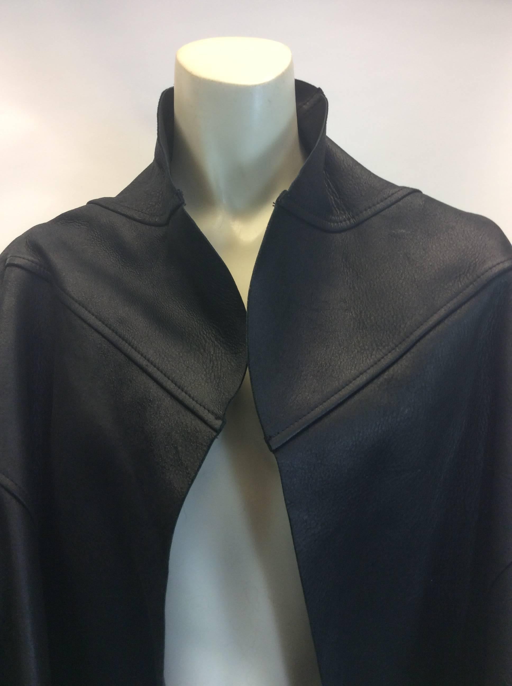 Rick Owens Leather Flared Cropped Black Jacket
Bell sleeve style
Interior tuxedo pocket
Black leather
$750
