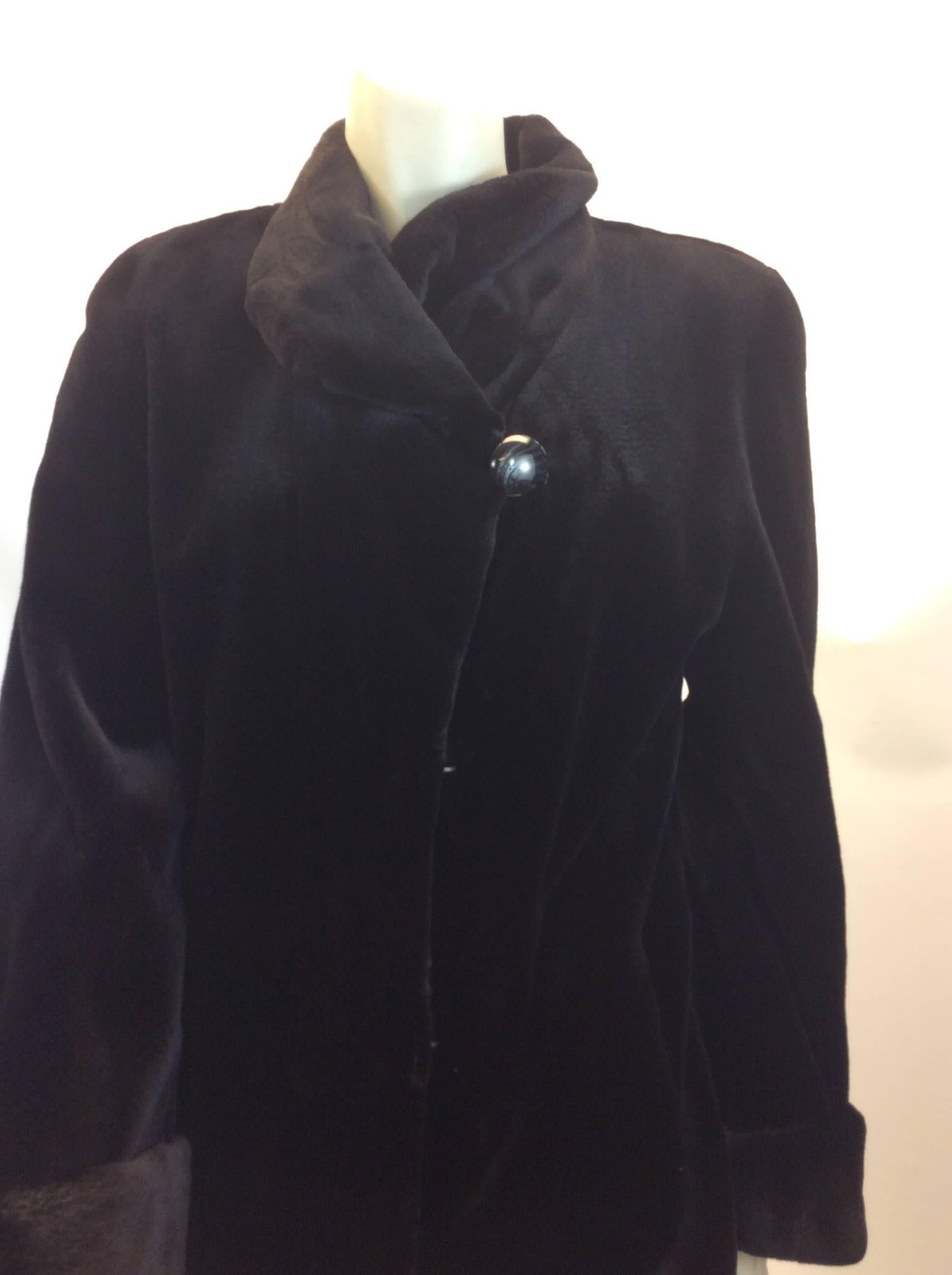 Long Black Sheared Mink Coat
One button closure at the top
$3500
