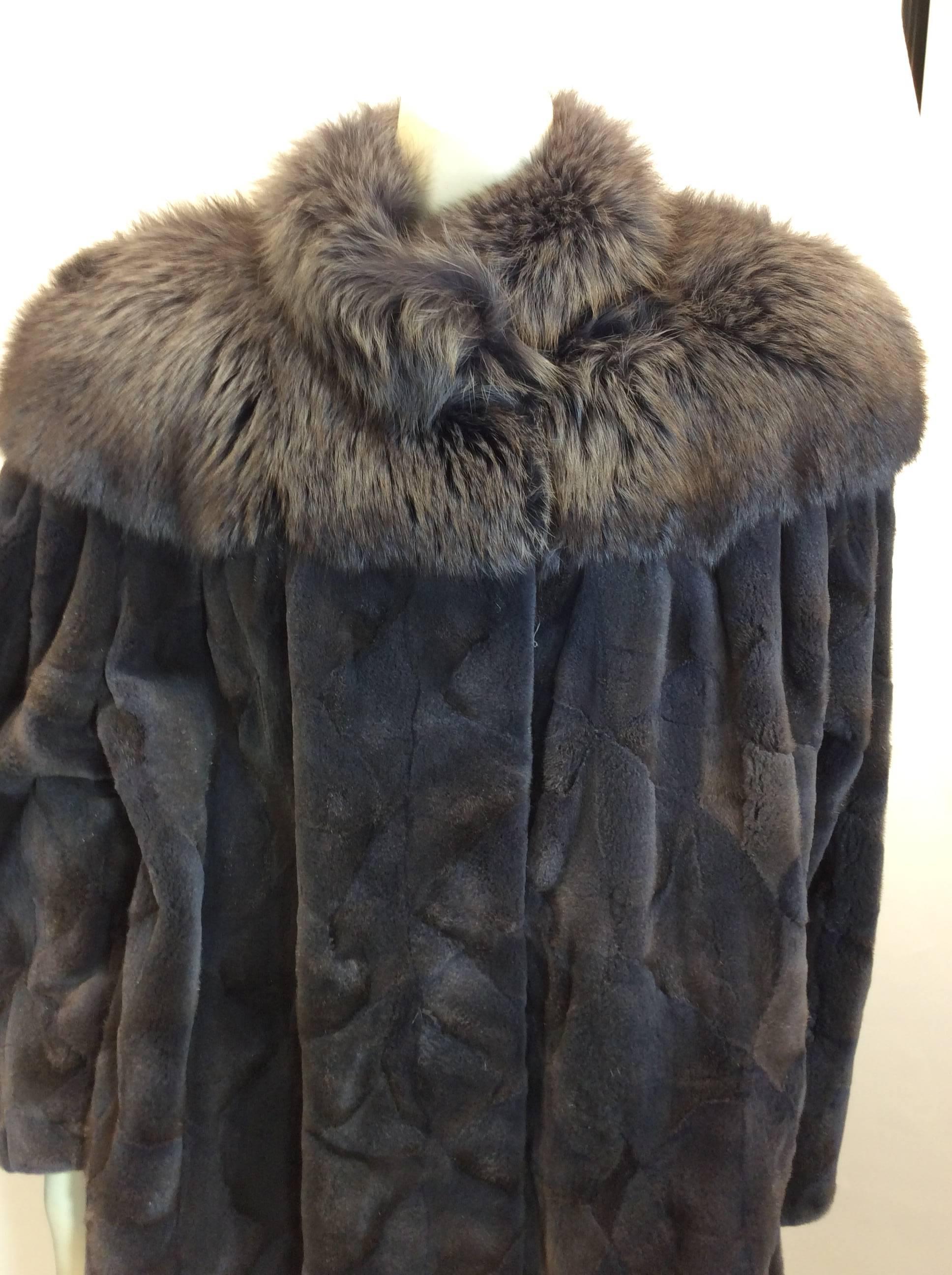Siberian Gray Sheared Beaver Coat with Fox Trim
$899
Large collar fox detail
Fully lined interior