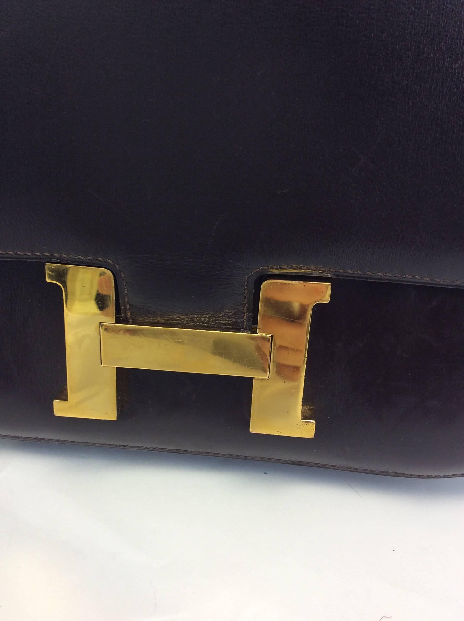 Hermes Vintage Brown Box Constance Crossbody Bag 
Chocolate brown box calf leather
Signature H logo
Snap closure on front flap
$3,300
Made in France