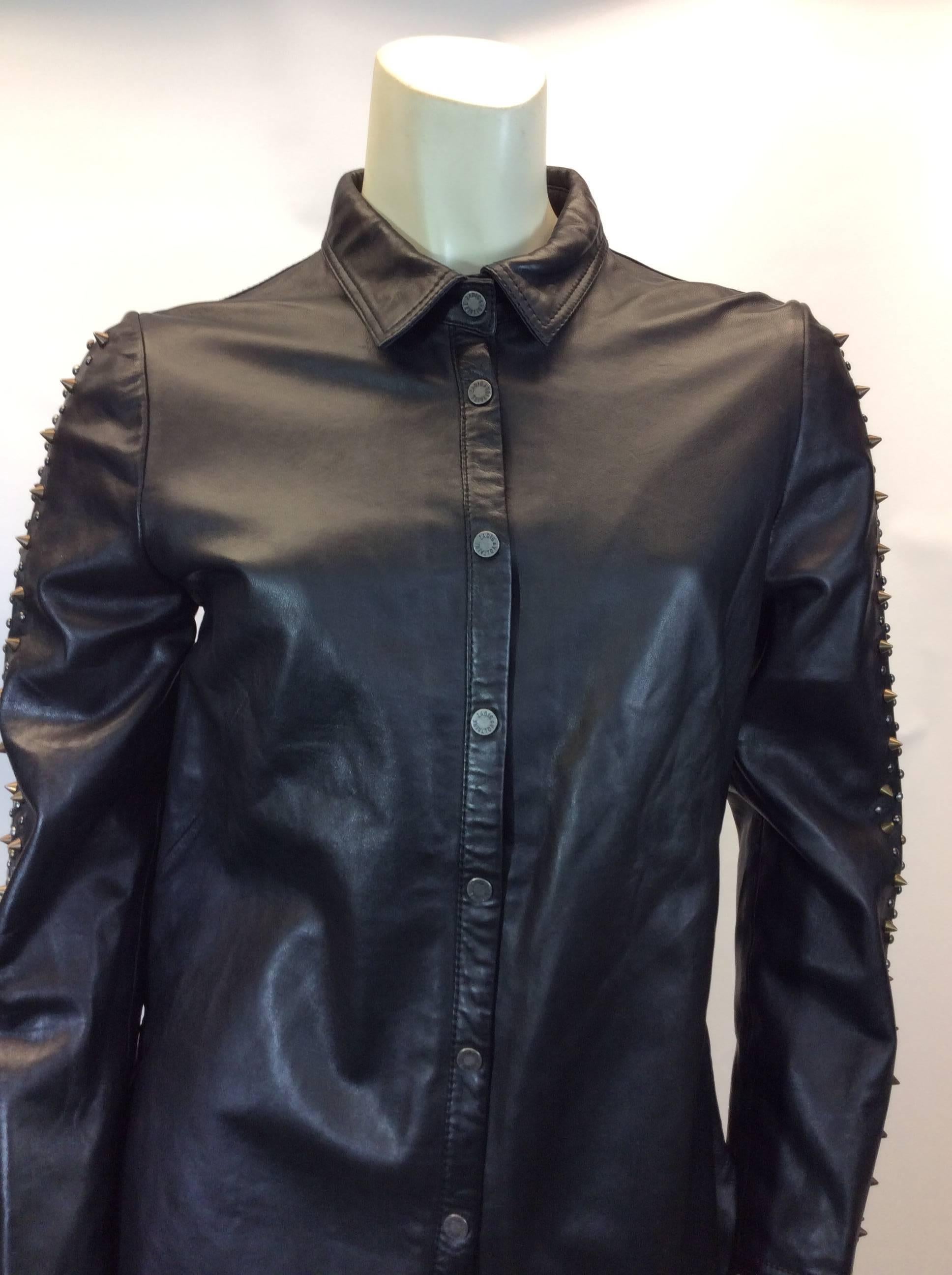 Zadig & Voltaire NWT Leather Snap Button Down Embellished Top
Retails for $880, our price $399
Made in India
Size medium
Fully lined interior
