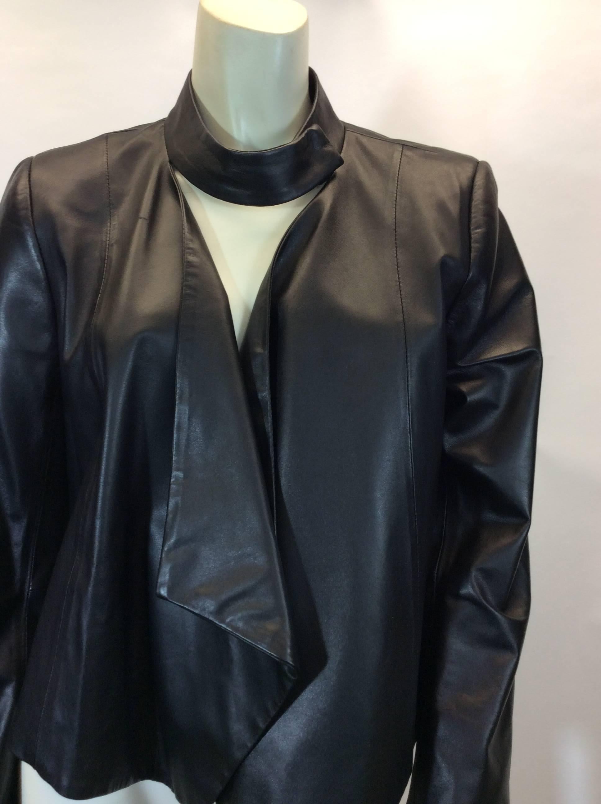 Intermix Black Leather Cropped Jacket
Size medium
Snap trend collar
$350
