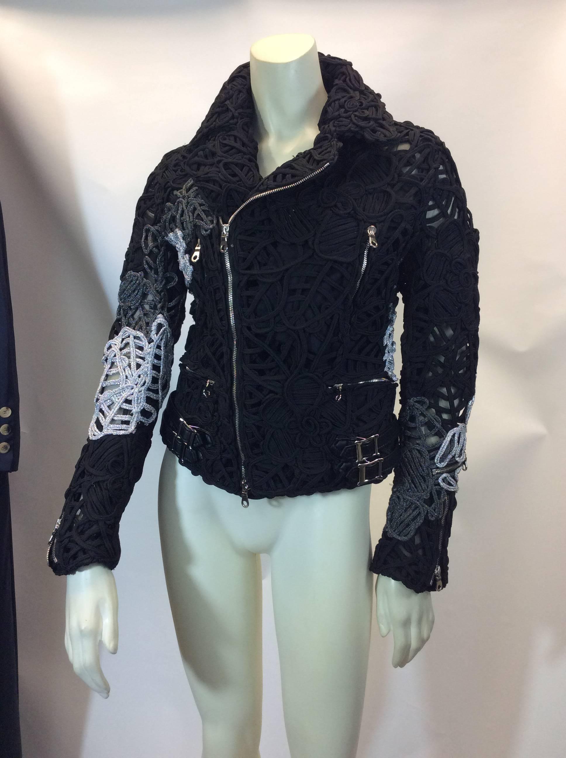 Commes Des Garcons Cord Embroidered Moto Jacket
$699
Size medium
Sheer mesh interior lining
Silver metallic cord with black
Silver toned hardware
