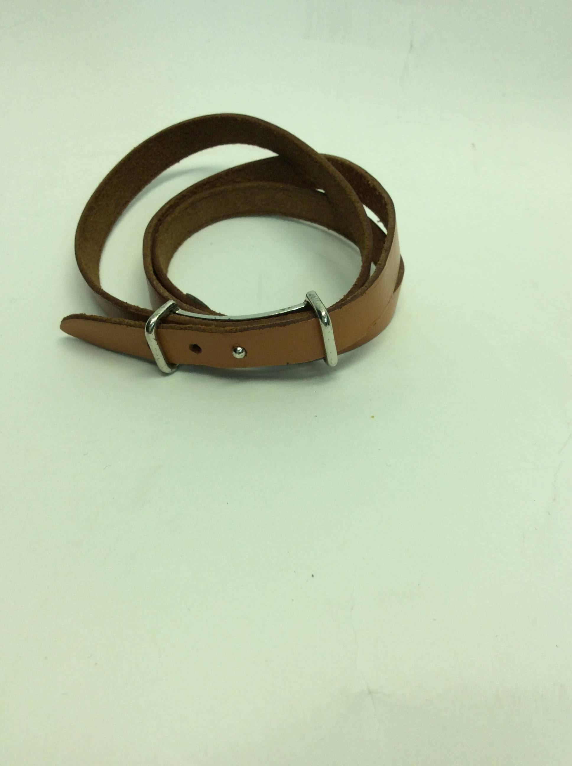 Hermes Brown Leather Wrap Bracelet
28 inches long
Silver toned hardware
Double wrap bracelet 
