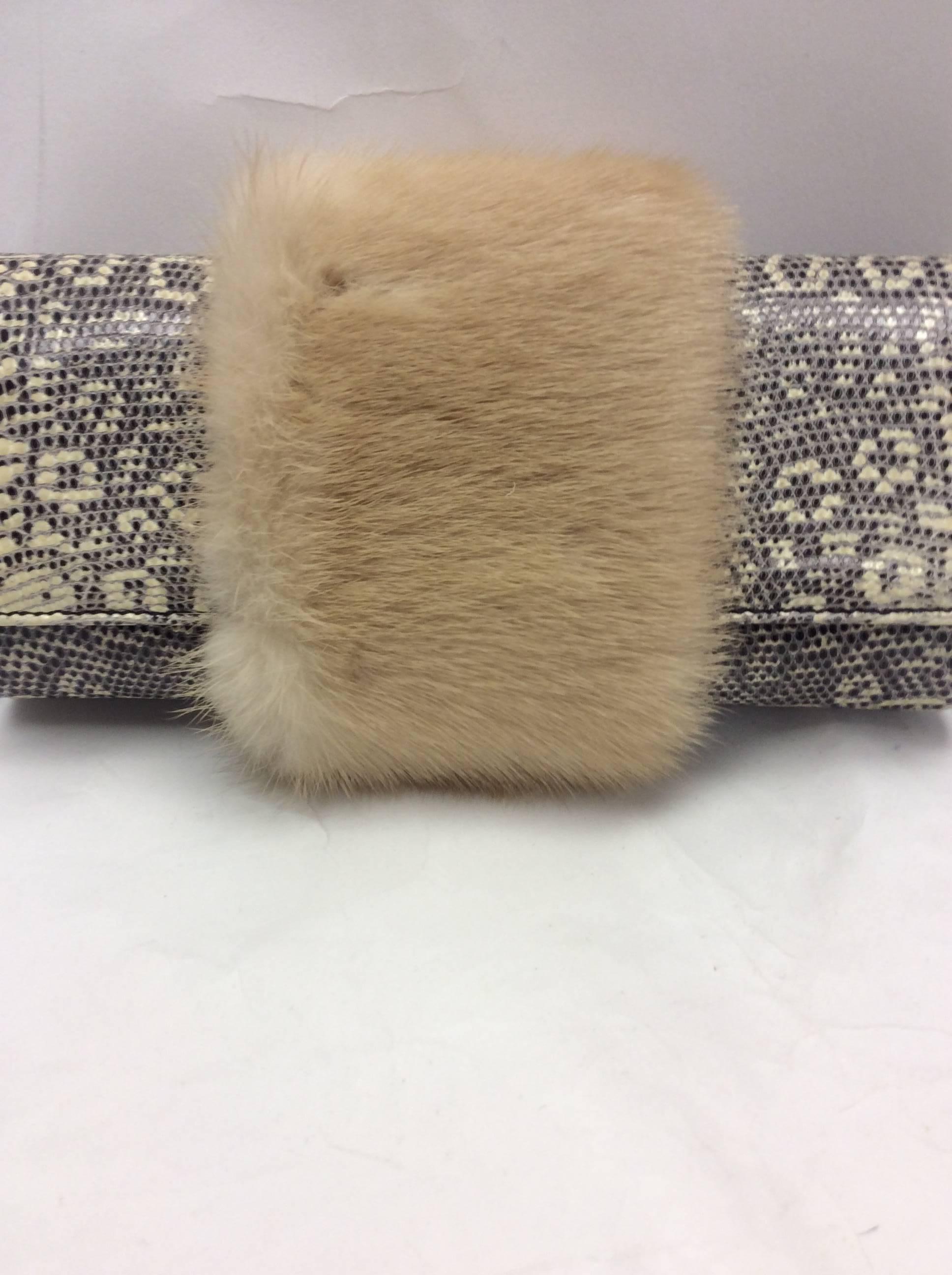 Salvatore Ferragamo Lizard And Mink Small Clutch
New with tags
$685
Blonde removable mink detail

