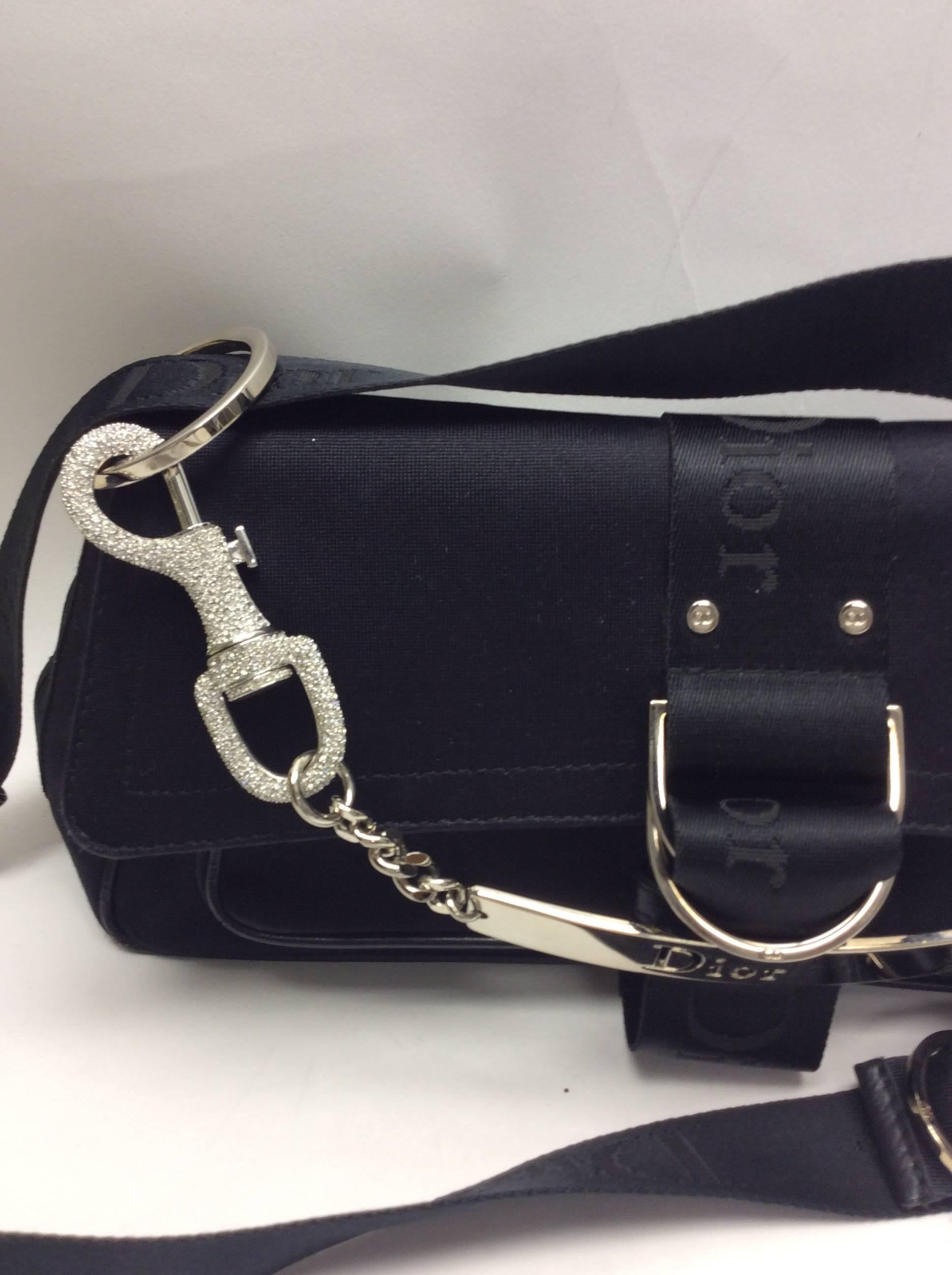 Christian Dior Black Satin Small Purse
Black satin small purse with dior charm details
$599
Silver toned hardware and silver chain detail
Crossbody strap
