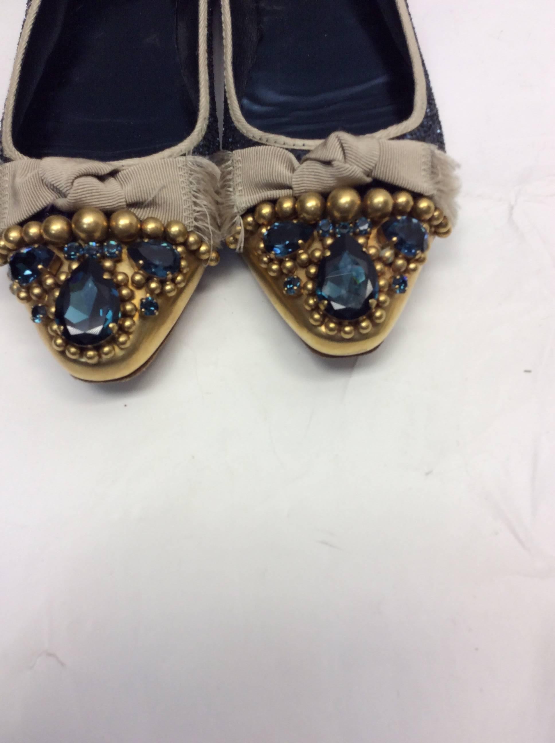 Miu Miu Blue Glitter Ballet Flats
Size 41
$199
Embellieshed canvas toe
Made in Italy