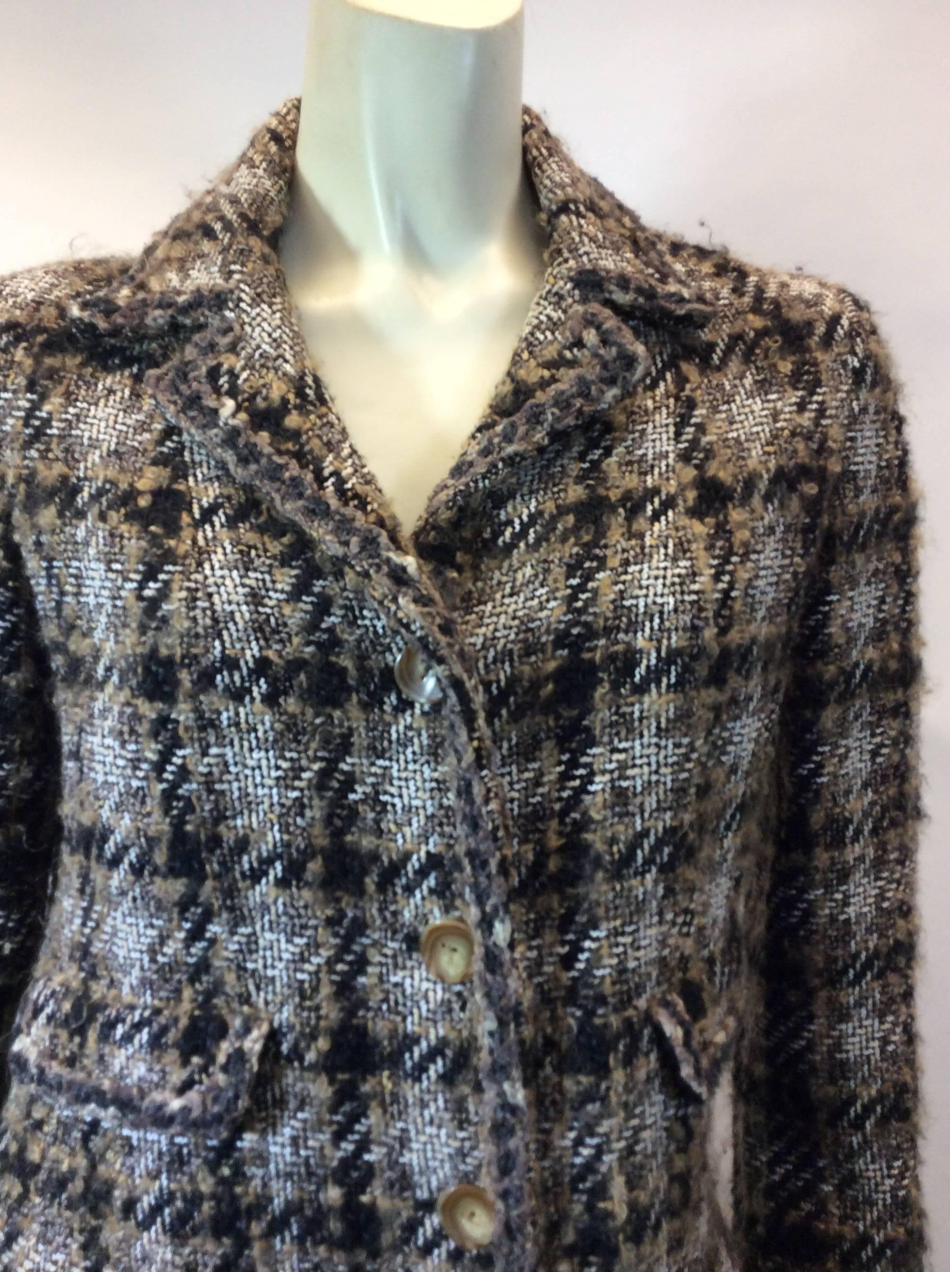 Chanel Brown Tweed Blazer
Size 38 
Wool, silk, rayon, mohair
$1200
Made in France
Fully lined interior