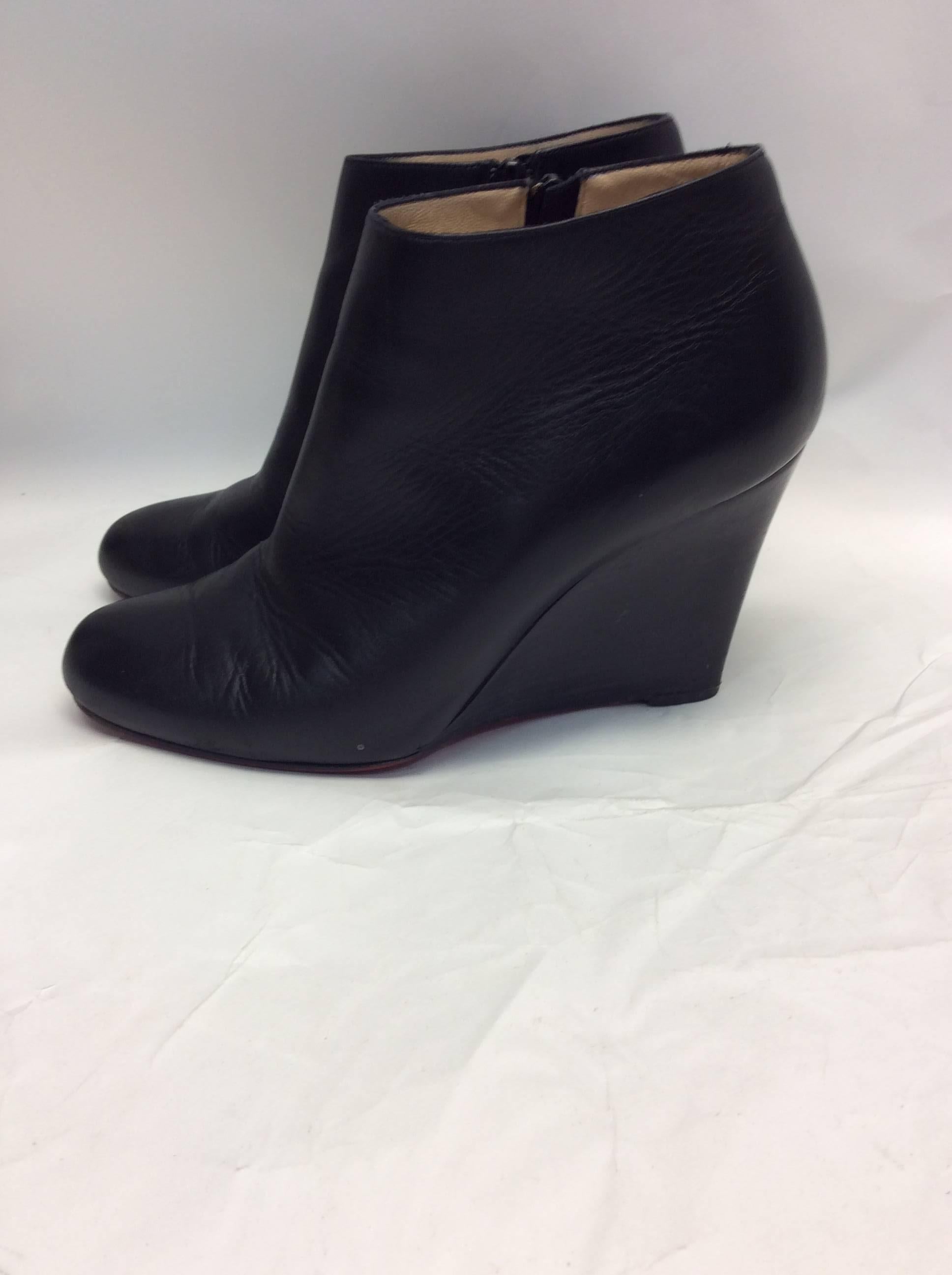 Christian Louboutin Black Leather Wedge Boots
Size 38.5
$299
Made in Italy
Leather
Beautiful black leather wedged Christian Louboutin bootie. 