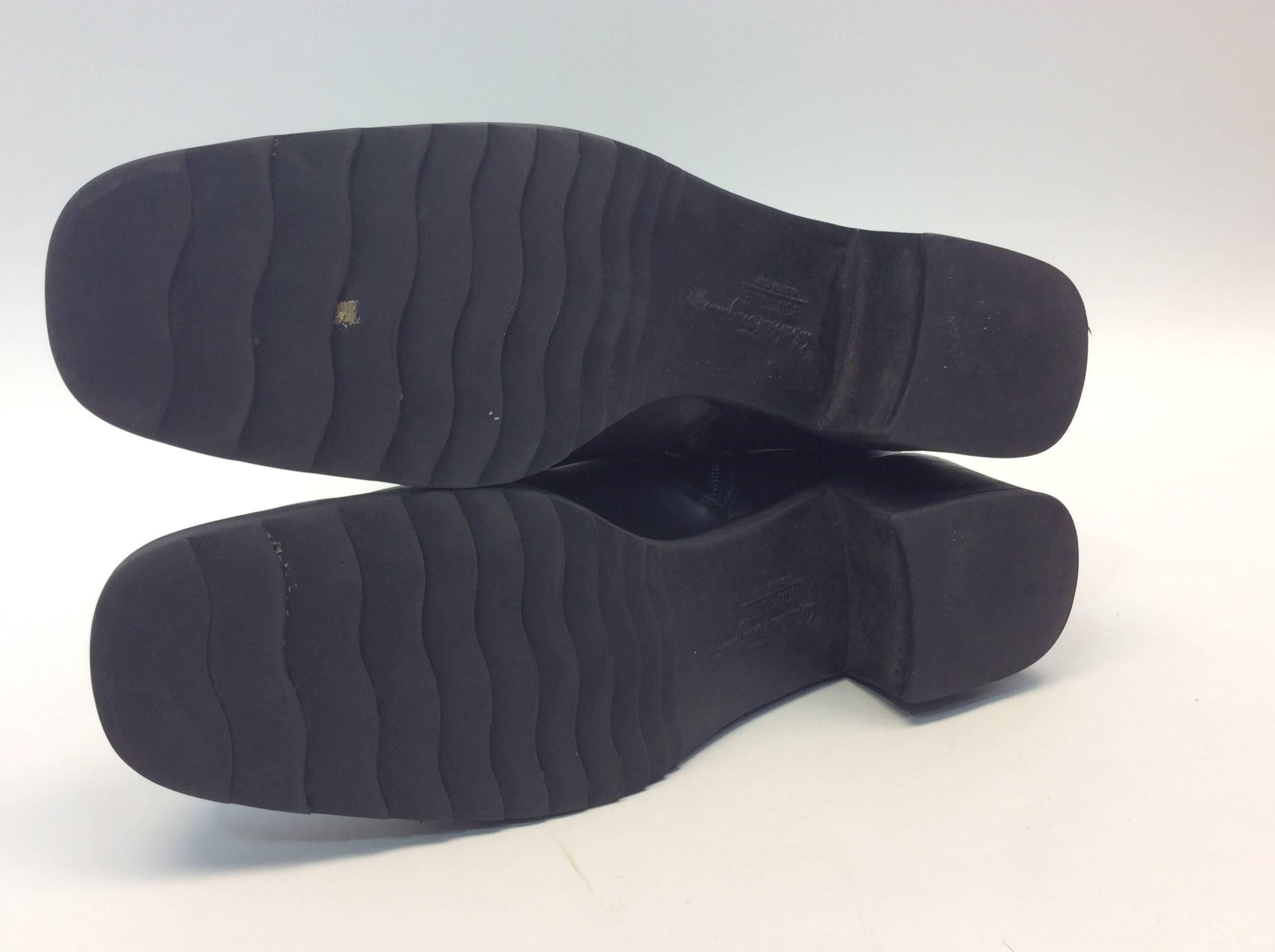 Salvatore Ferragamo Black Leather and Shearling Boot For Sale 1