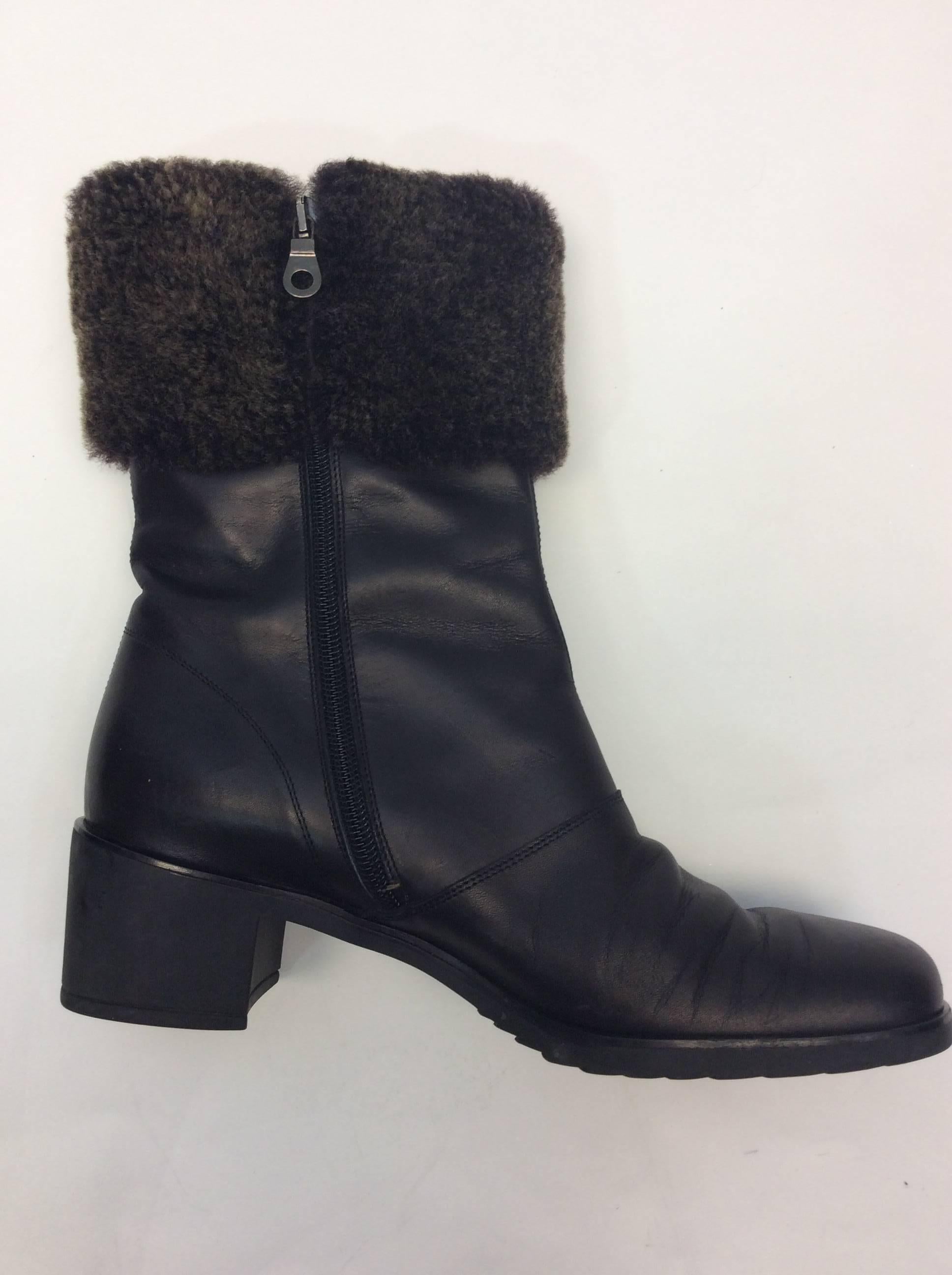 Salvatore Ferragamo Black Leather and Shearling Boot For Sale 4
