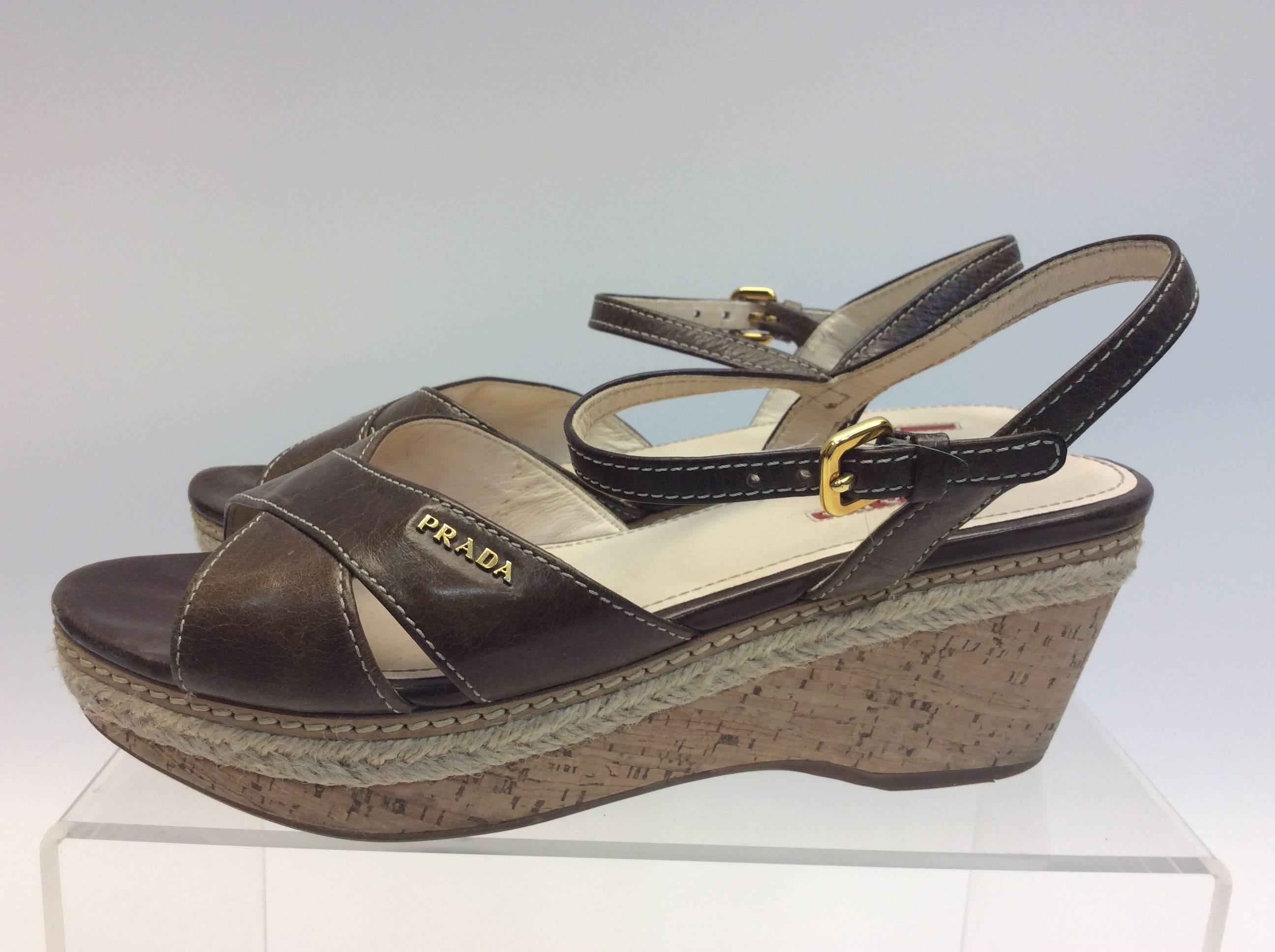 Prada Brown Leather Wedge Sandal
$136
Leather
Size 38.5
1” platform 
2.5” heel


